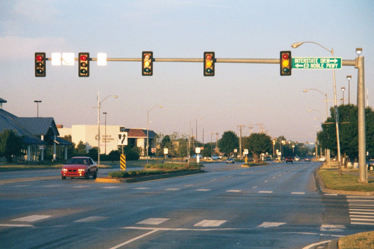 Journeying west on Main Street: Sooner Mall is on the right. In the left background, the building built by the Bank of Oklahoma, previously