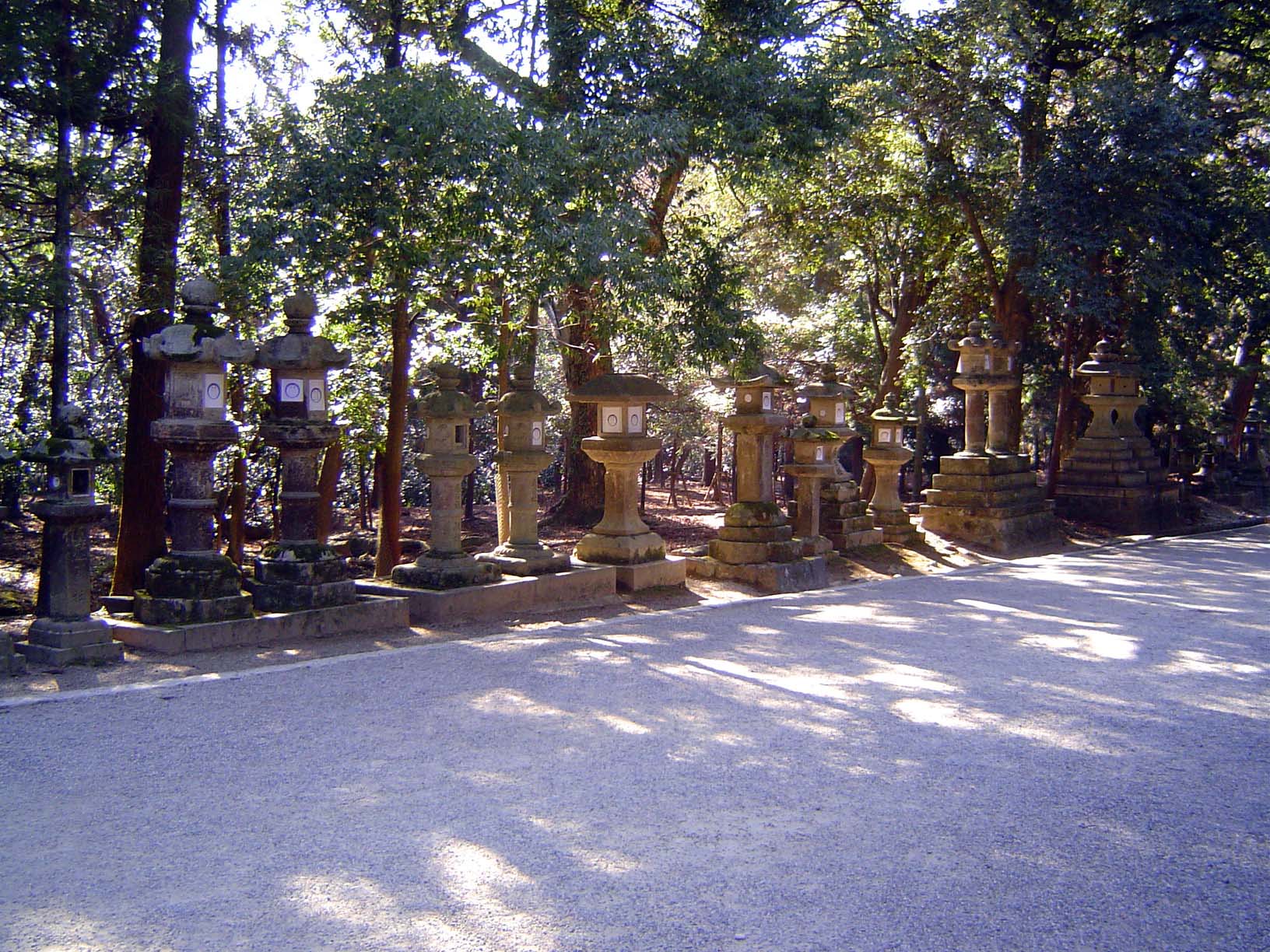 The approach passes some 3,000 stone lanterns, lit twice yearly on February third or fourth and August fourteenth or fifteenth.