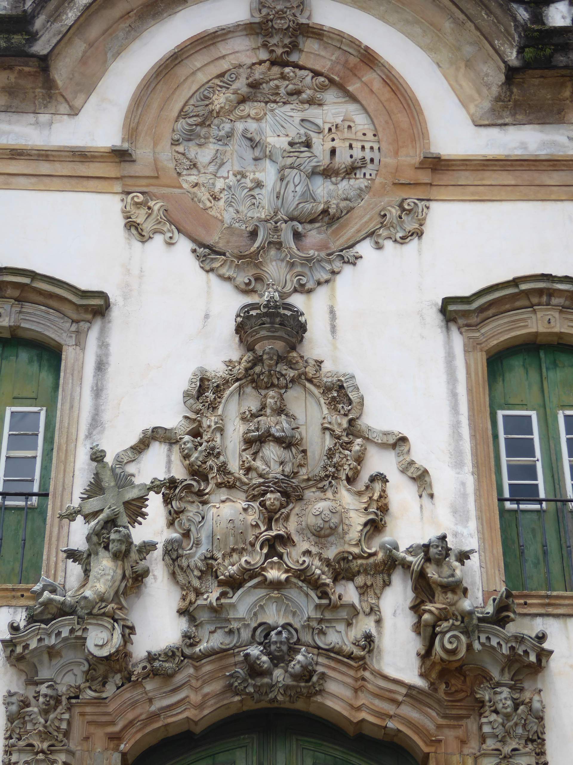 The sculptures are in soapstone; the one at the top shows Francis in ecstasy and/or receiving the stigmata. It's by Aleijadinho, the "little