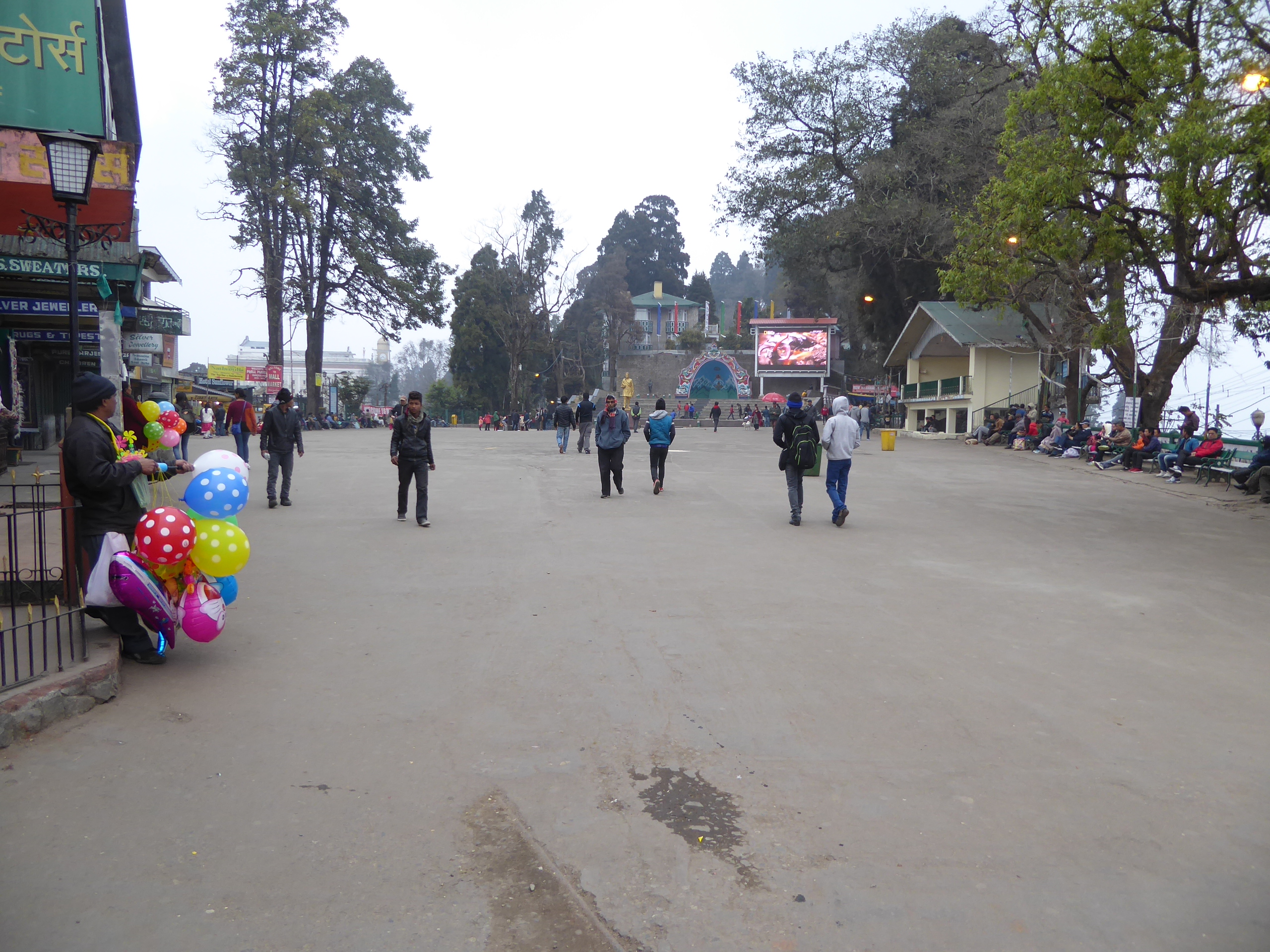 We're come up to the ridgetop and Chowrasta, the plaza of the "four roads." Call it Darjeeling's Piccadilly Circus. The good thing about it