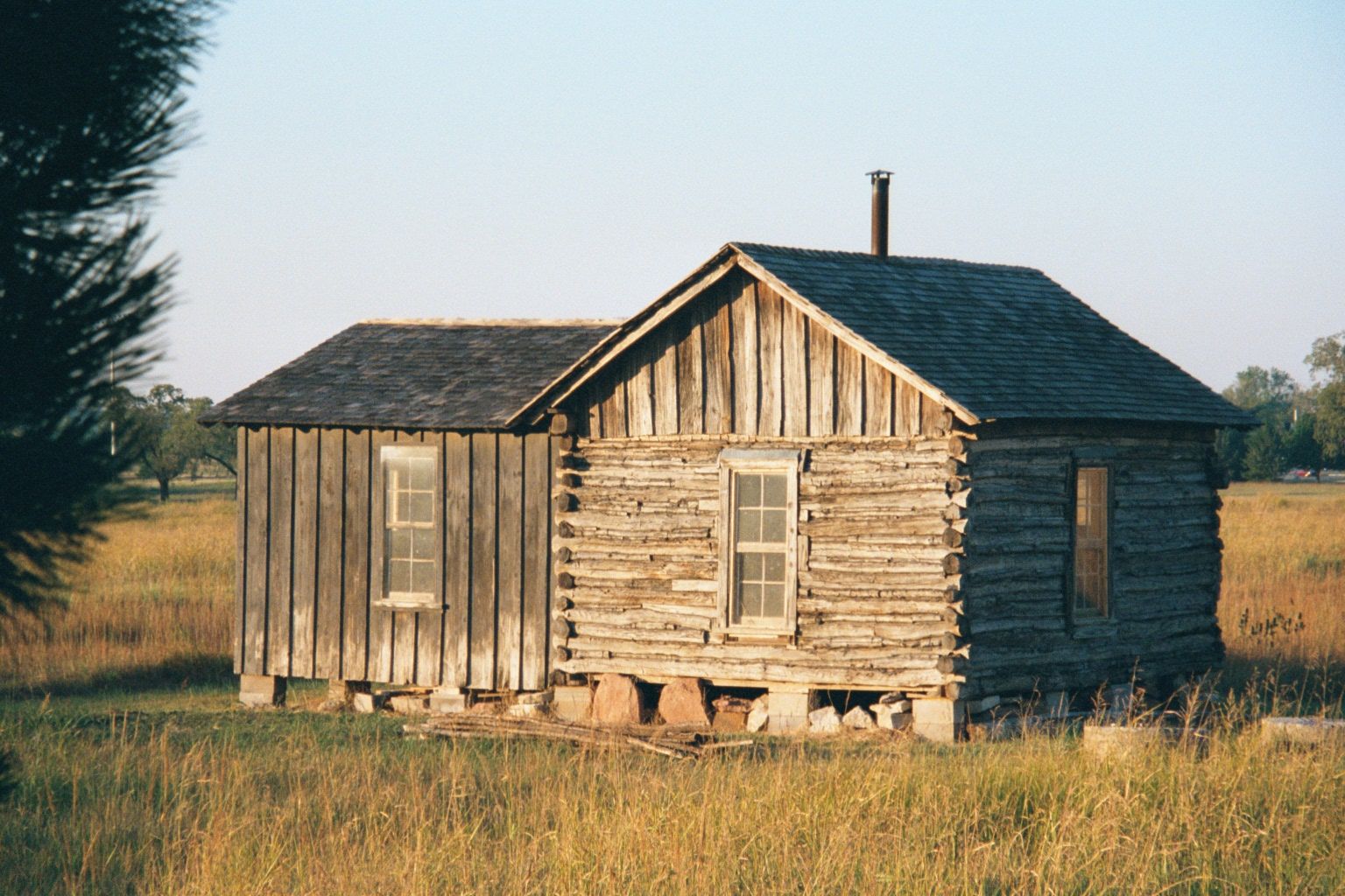 A couple of miles to the south, and next to the state's new museum of natural history, another cabin, the Neal Family Cabin, was trucked in