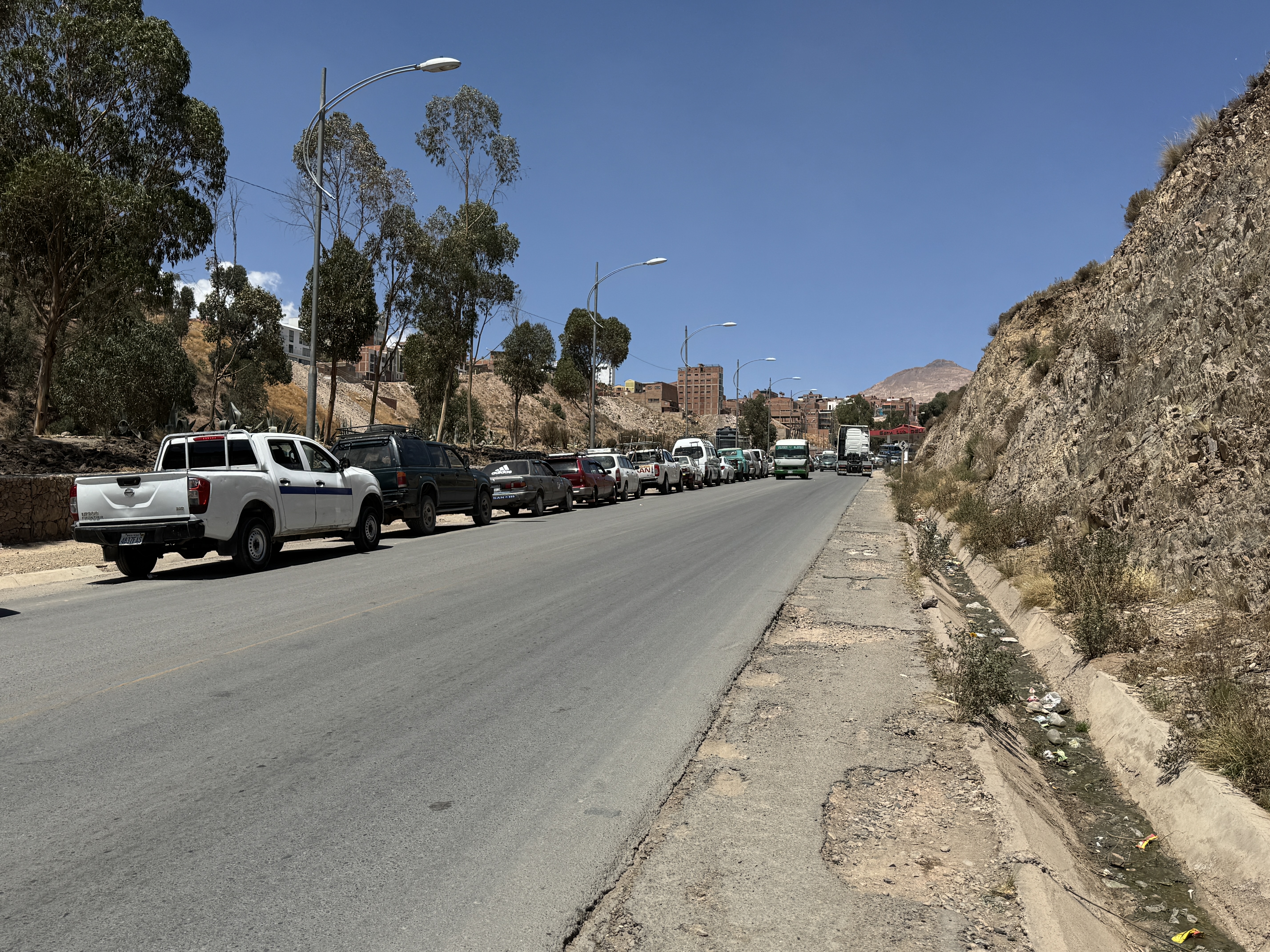 What have we here?  Why, obviously, a line of vehicles waiting for fuel.  It's a saga.