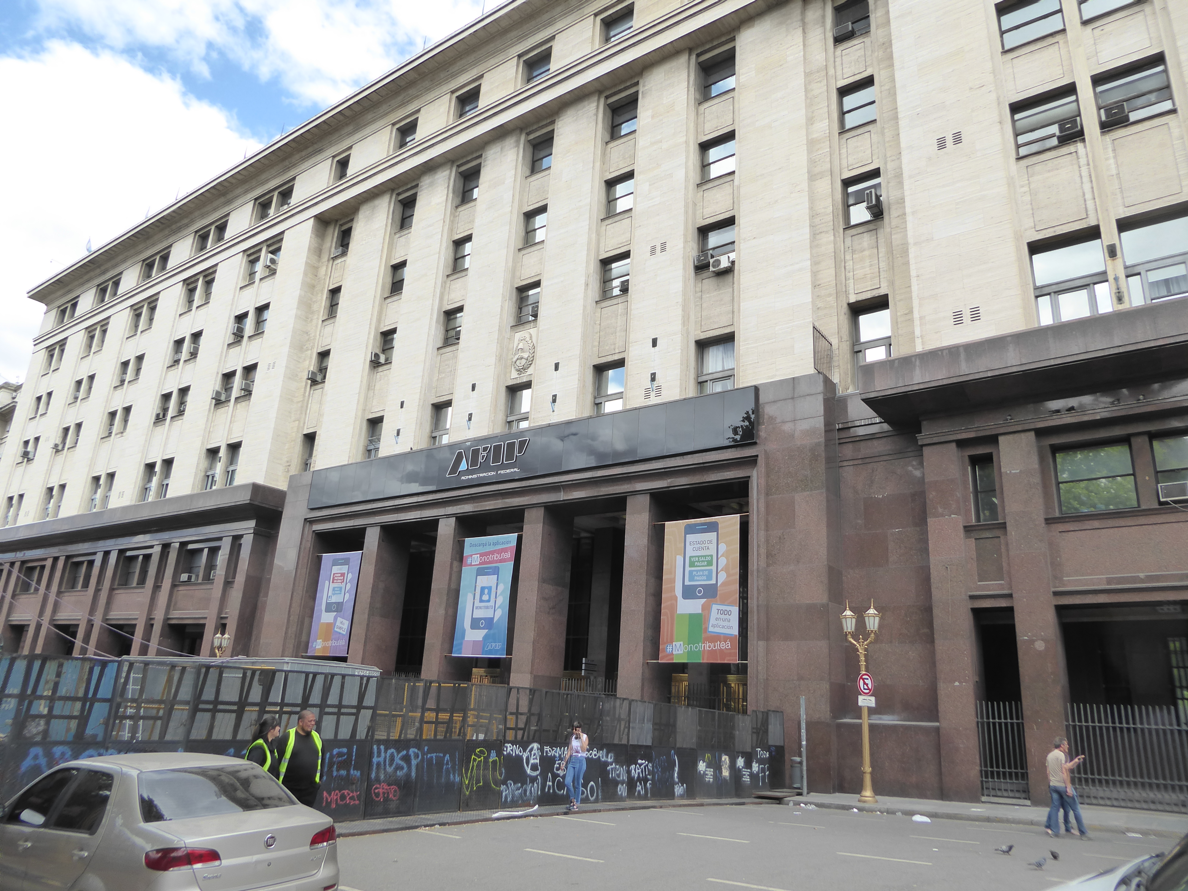 Somehow the people in the nearby offices carry on, in this case in this Ministry of the Economy building from 1939. The almost indecipherabl