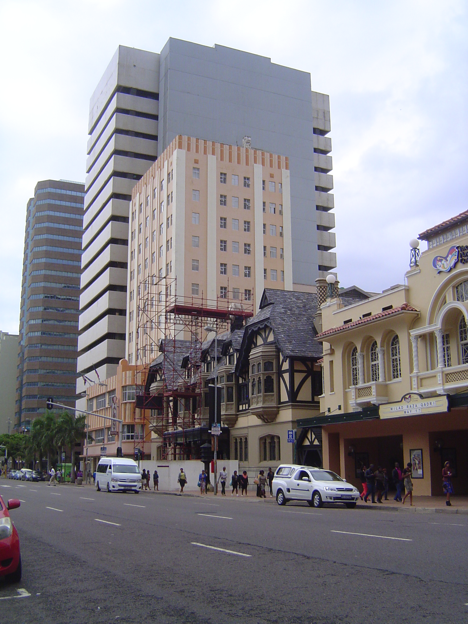 How's this for a lineup? At the far left is the charming Embassy Building, an office block faced with dark, precast concrete. Then there's t