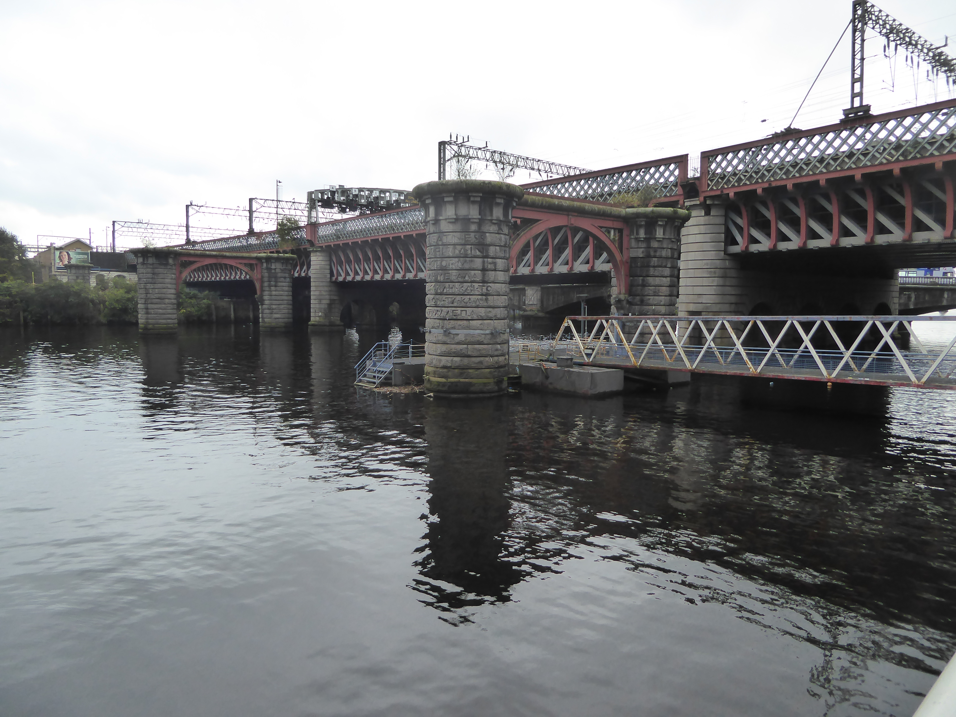 So we're back to the river and between the two pedestrian bridges where we started. In front of us are two bridges built for the Caledonian