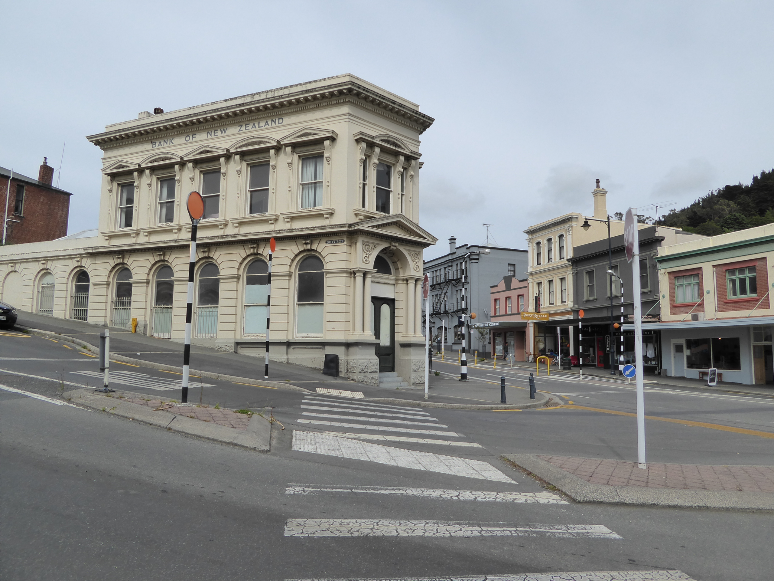 The dark building has been stripped down over the years but began in 1881 as a pharmacy and stayed that way until 1987. More recently, it's