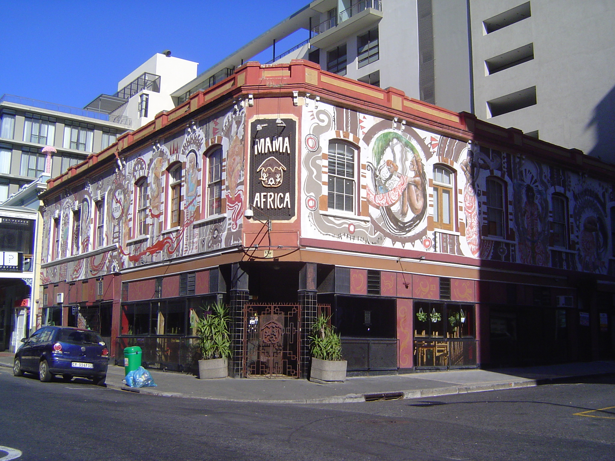 Yikes. This building gained its second story in 1899, when it also acquired verandas and cast-iron railings. An out-of-control taxi brought