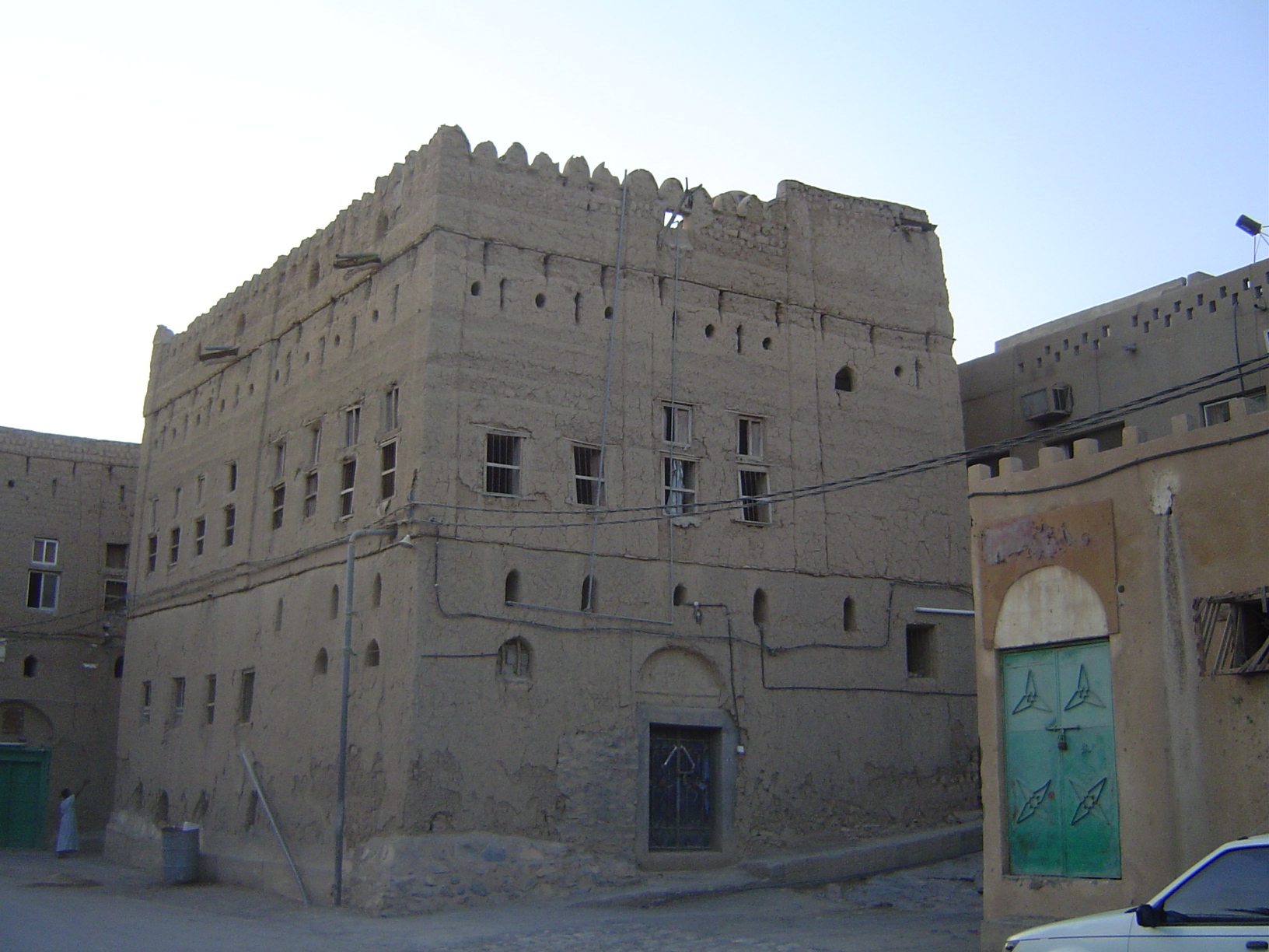 A building of many windows, some old-style and others new.