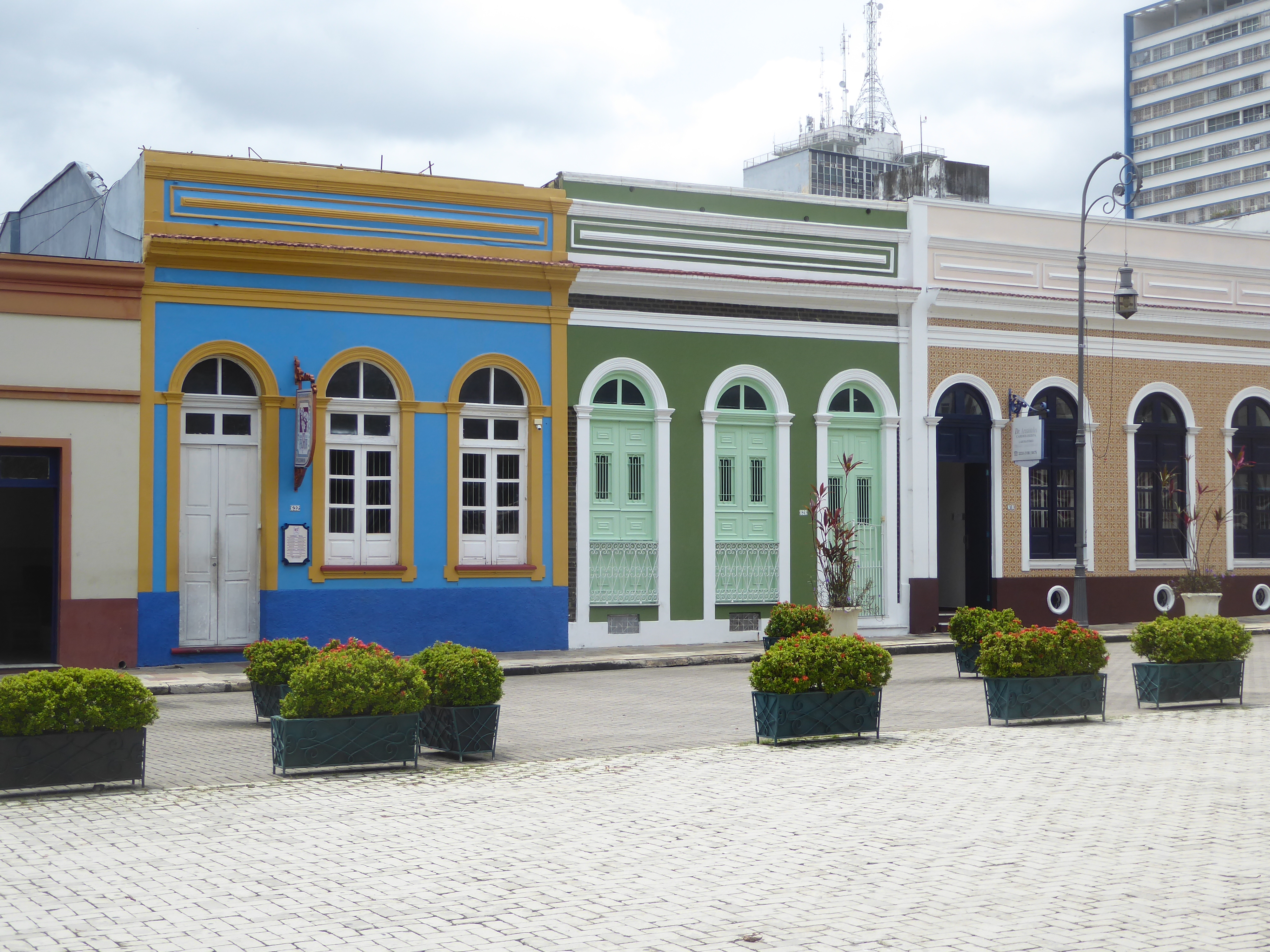 The shops around the plaza have been meticulously spruced up. Call all this the spillover from the second boom, the one created by the duty-