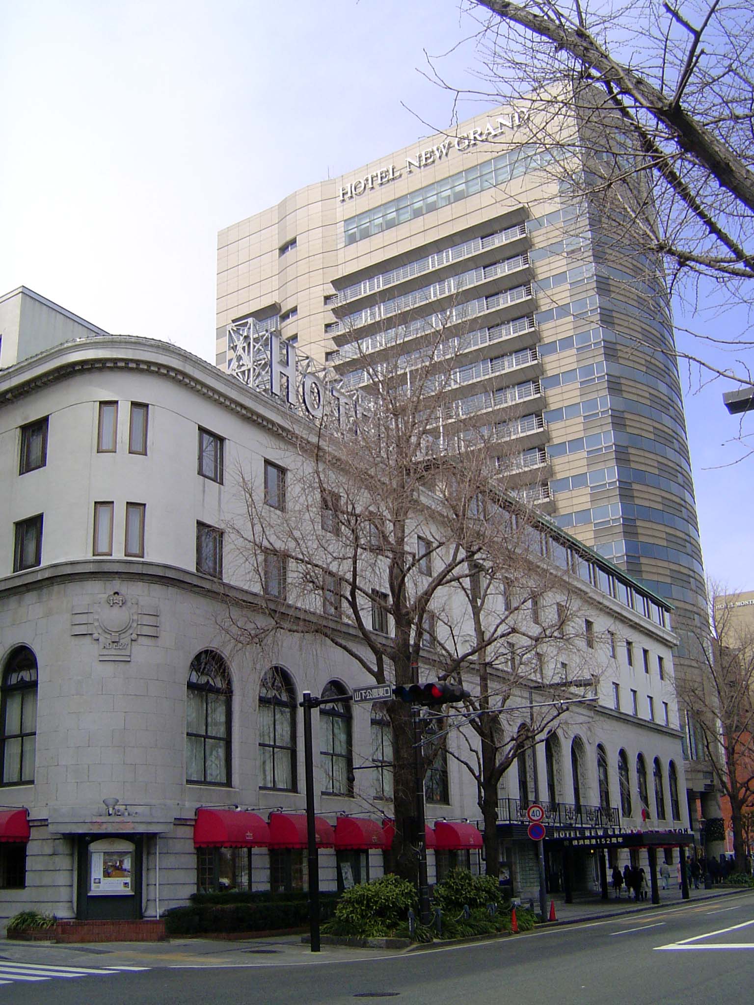 The New Grand Hotel, 1927. MacArthur is said to have set out here on that day in 1945 when—no tie, open collar—he met the Japanese on the de