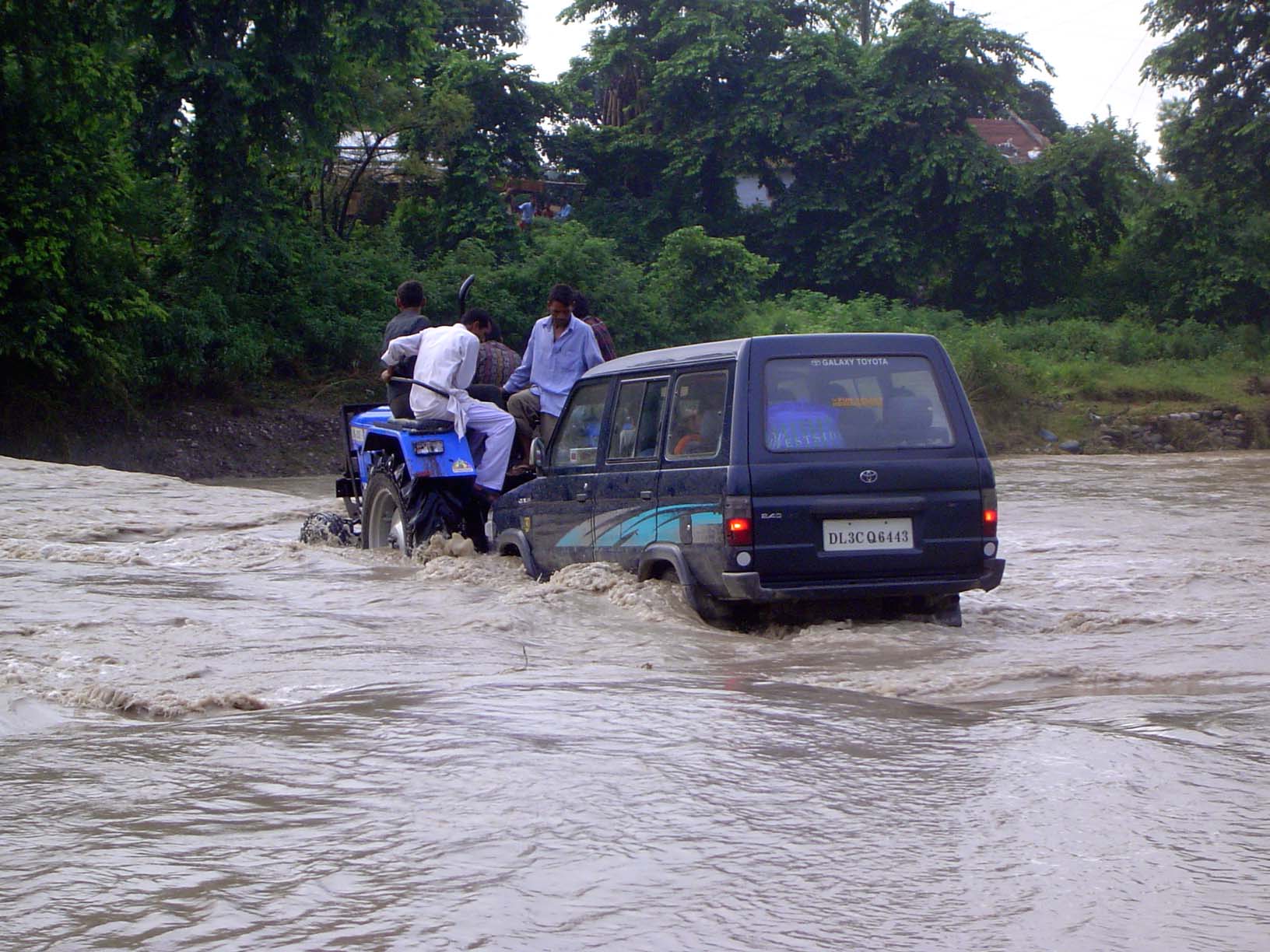 An SUV follows in tow.