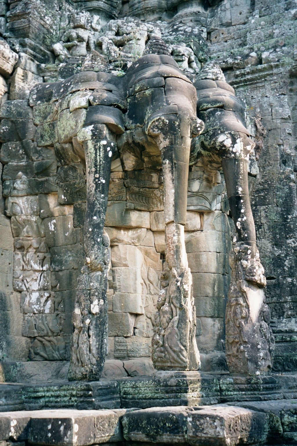 A closer view of one such elephant: the riders damaged are the god Indra and his flanking consorts.