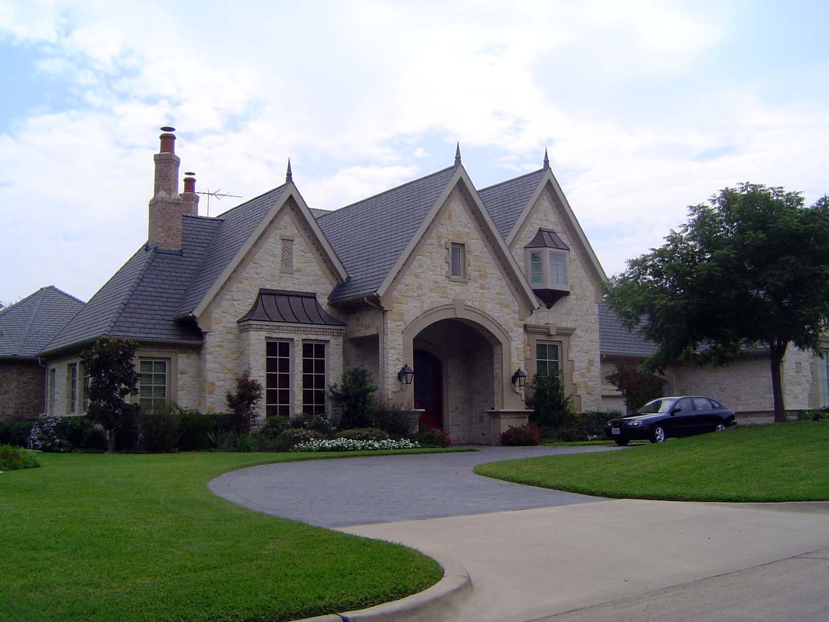 A mile or so to the south, just off Belt Line Road and across from the Prestonwood Country Club, there's a subdivision that isn't gated but