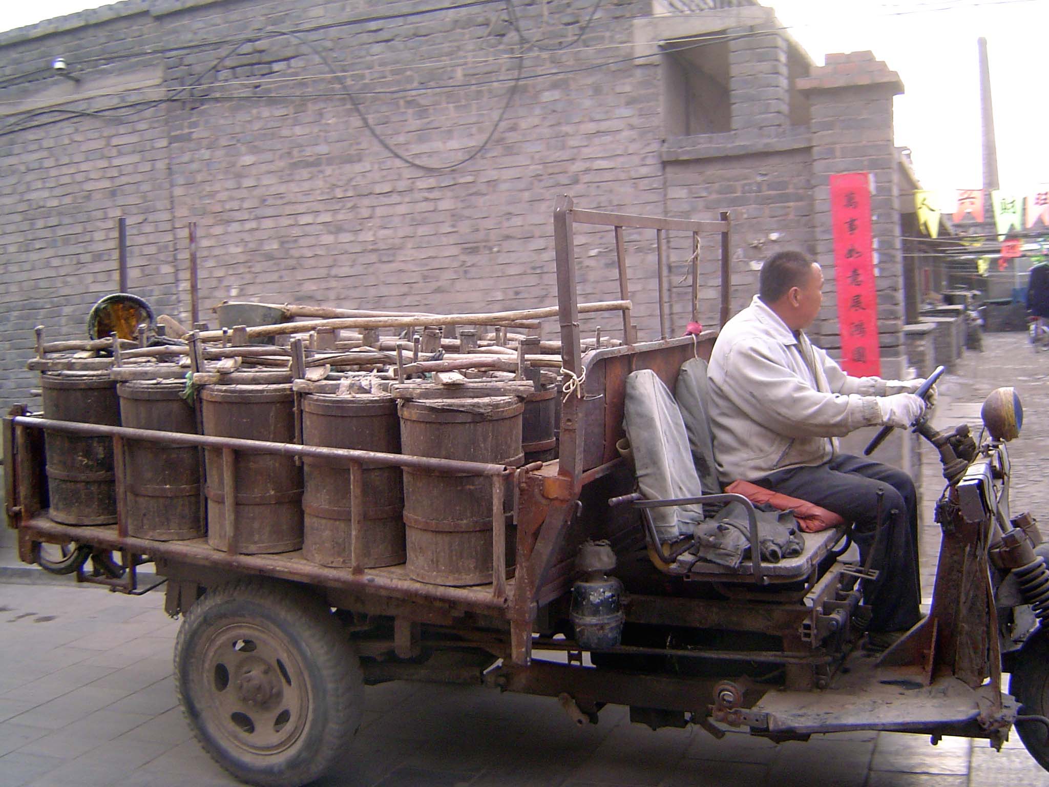 Pickup by tricycle.