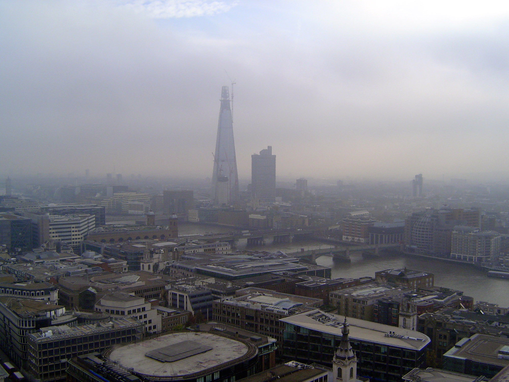 To the southeast, the Shard rises in gloom. Dare we venture another name for it: the Dalek?