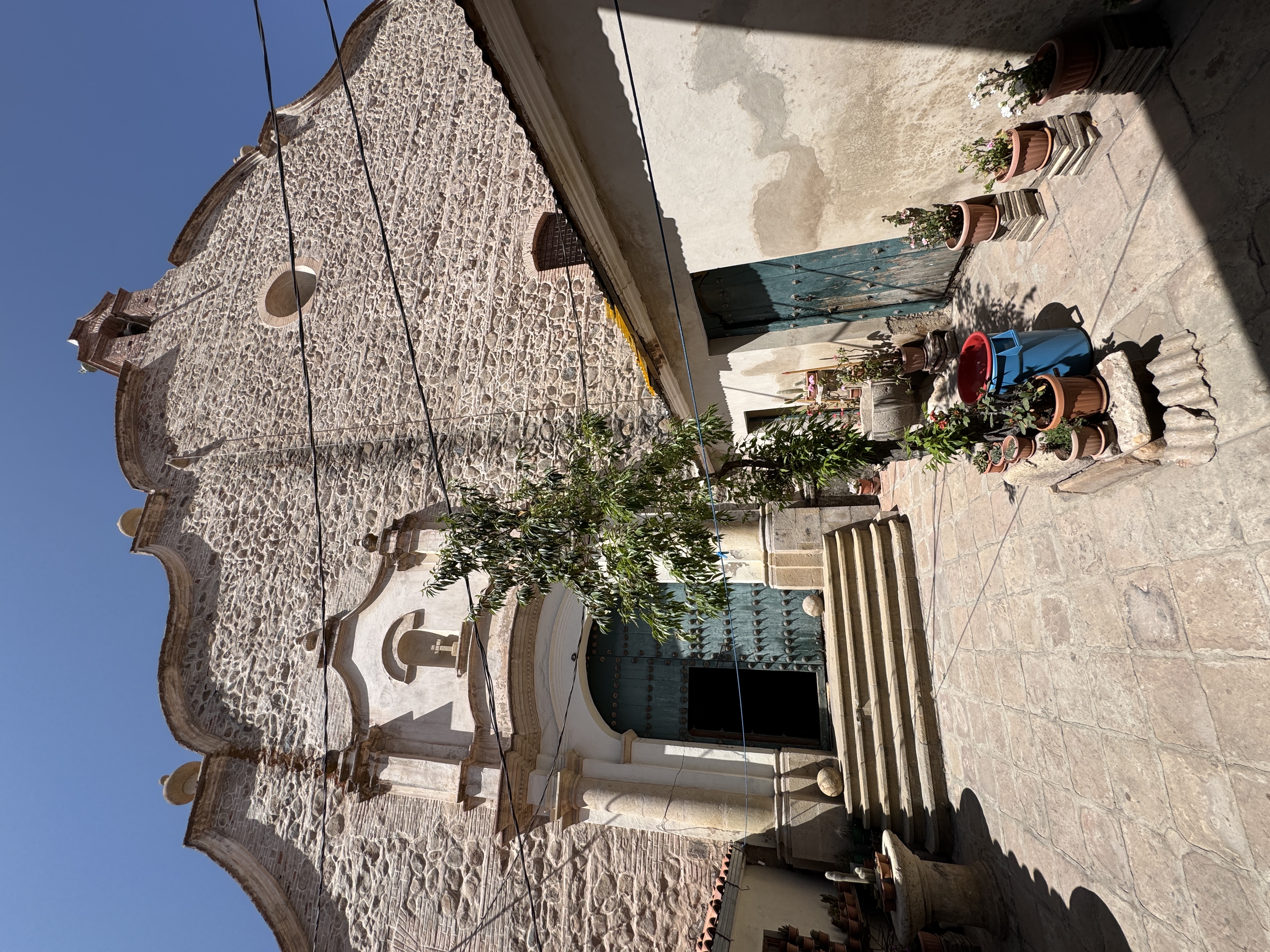 We've come around to the back door of the cathedral, because the front door is closed except for Sunday services.  This one will open if you