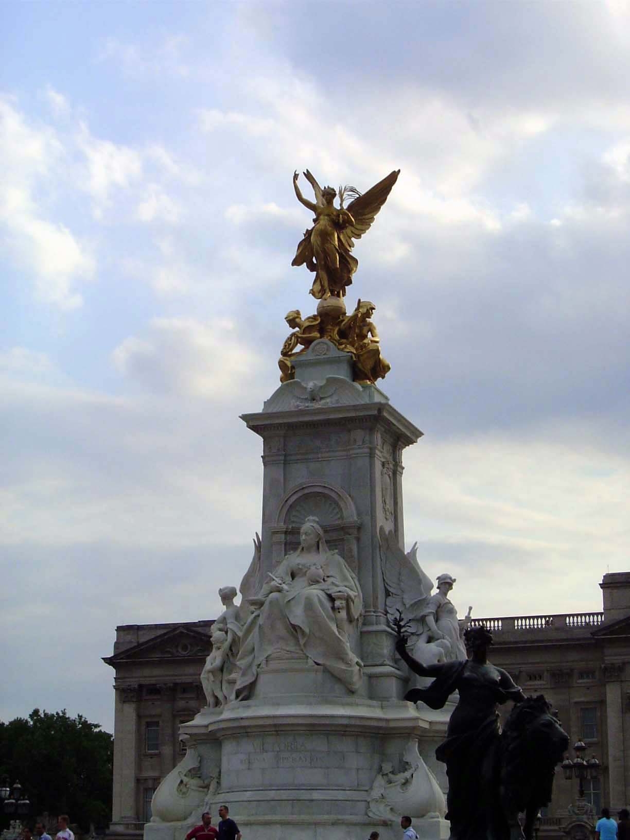 Appropriately for an maritime power, the base is quartered with wide-bellied ships while the angels of justice, truth, and charity stand on