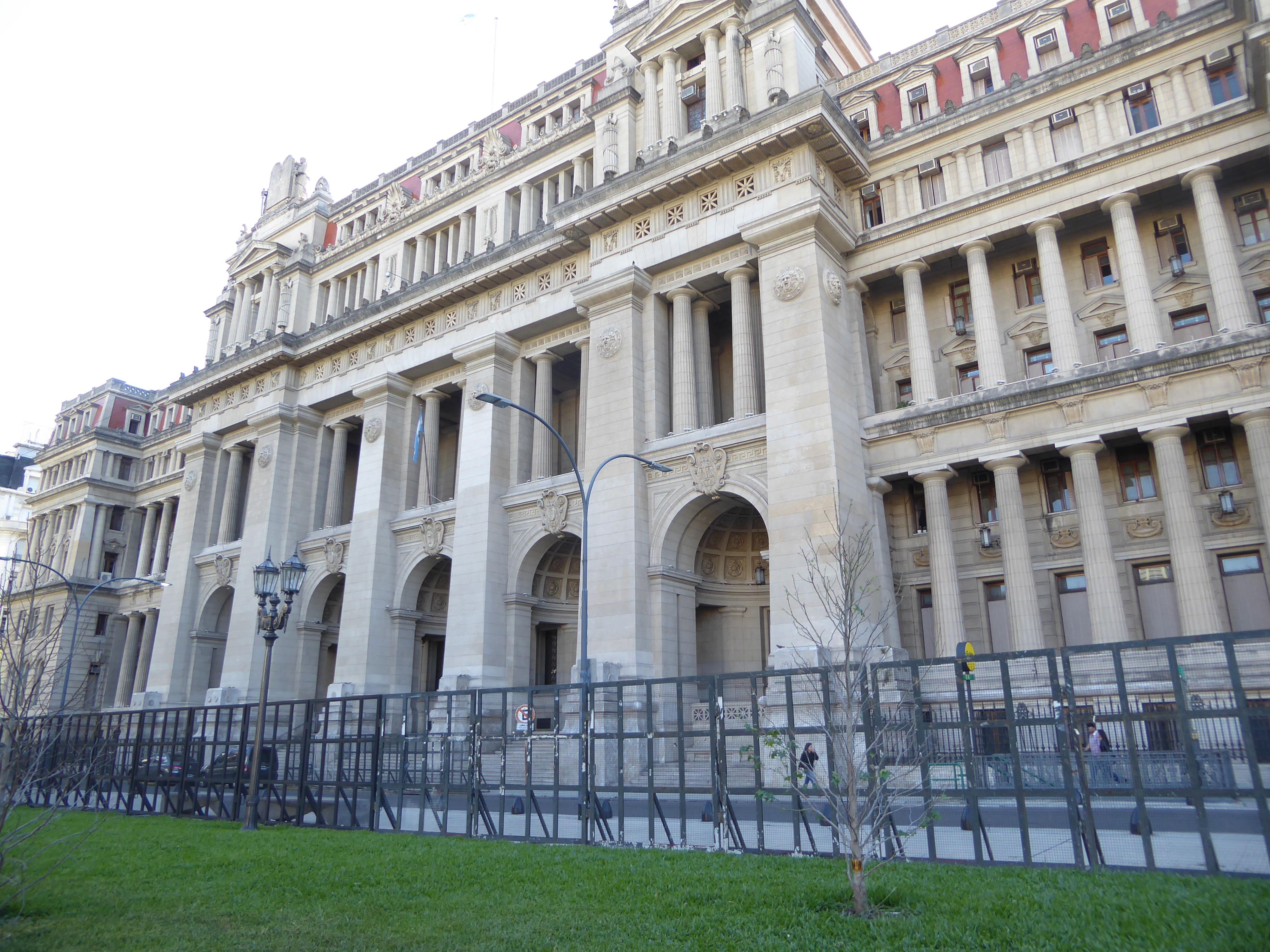 The school and theater both look across the Plaza Lavalle at Tribunales, the law courts whose construction took forever. Officially finished