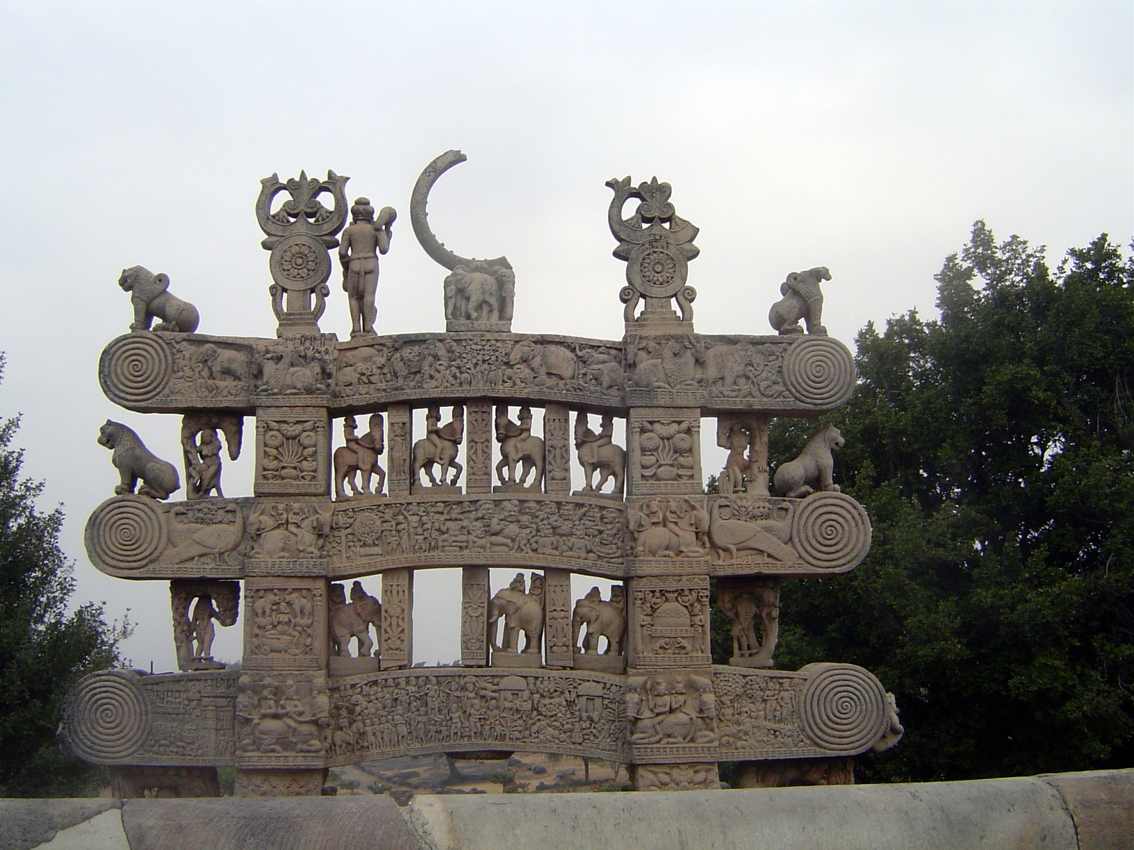 Here we look at the rear side of the north gateway. There are seven freestanding figures on the top. Fragmentary as they are, they're still