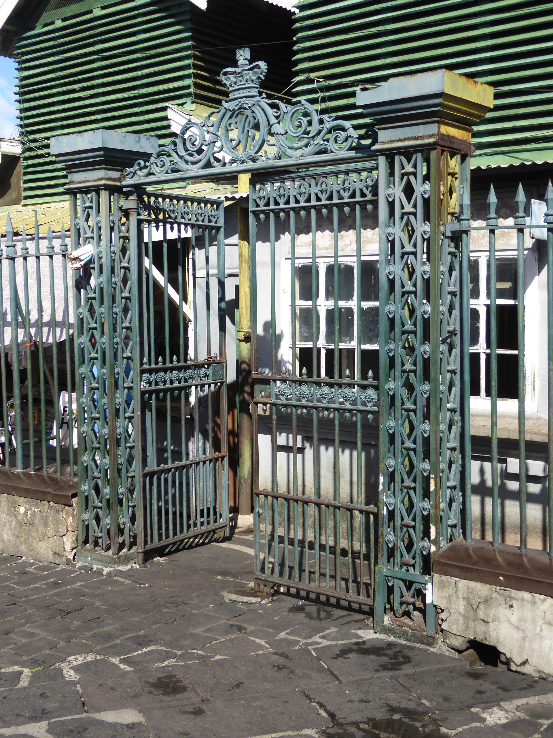 A gate to the bazaar carries those initials found in so many ex-British countries: VR.
