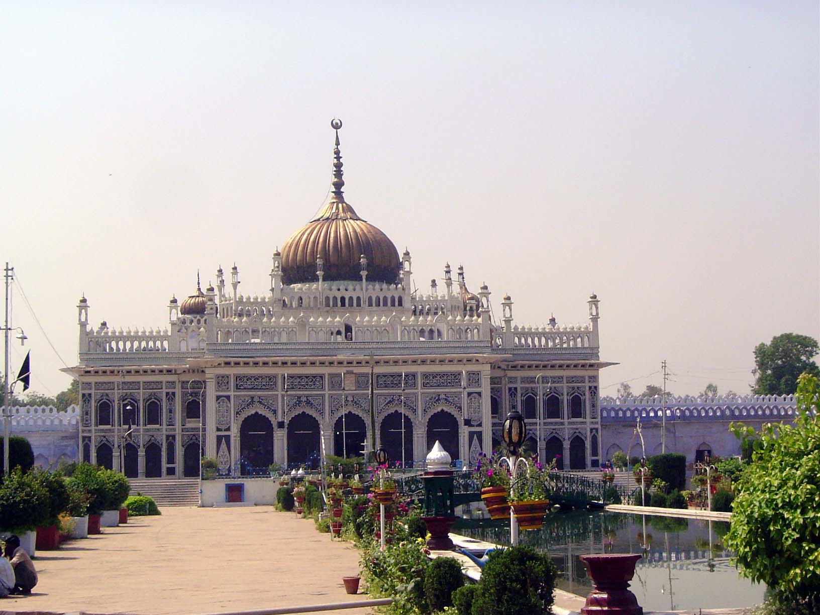 The imambara was begun in 1837 by Muhammad Ali Shah. The axis has always had a talao or pond.