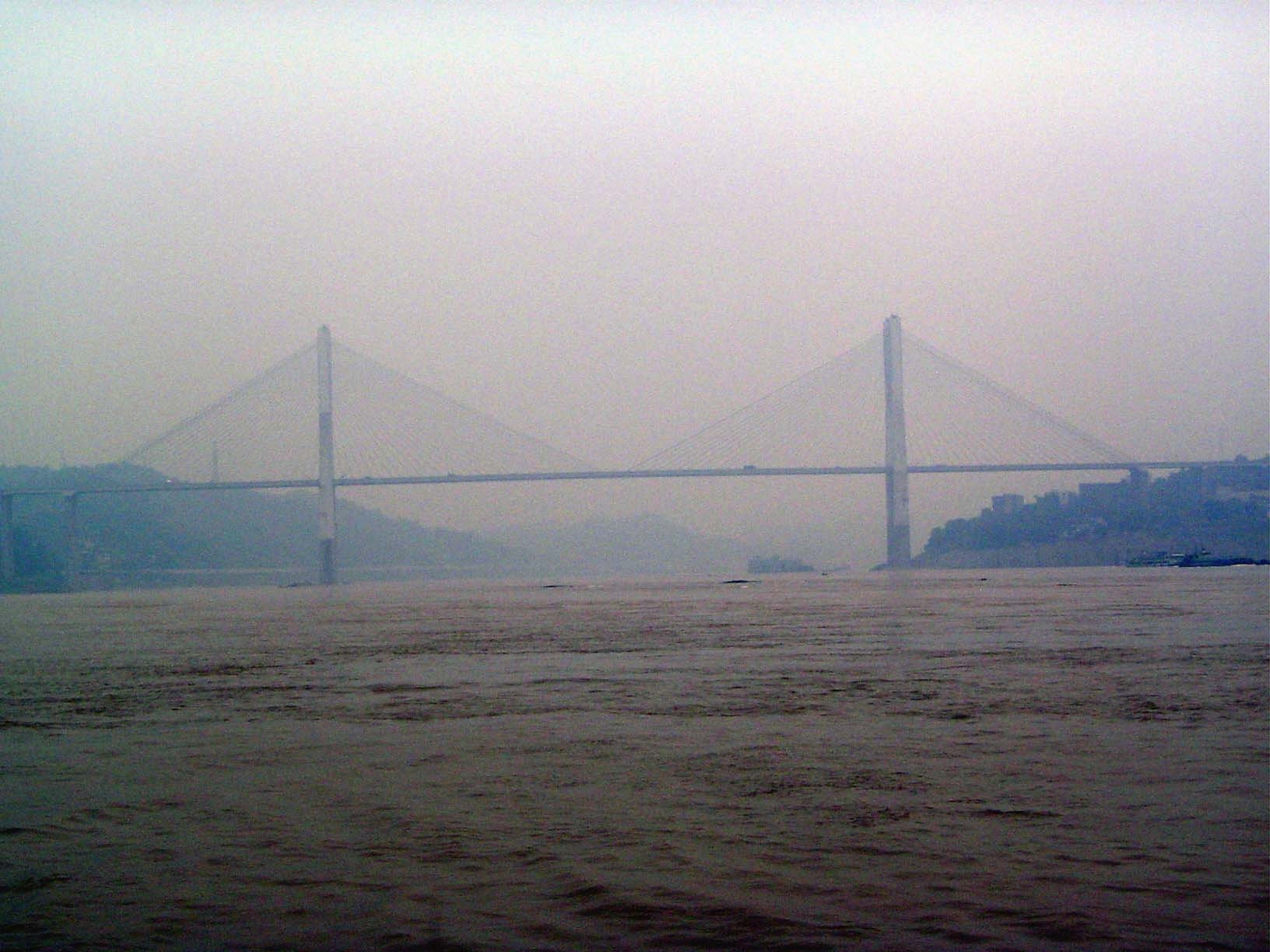 A few miles downstream: Dafushi Bridge, part of a circumferential expressway circling the expanded city.