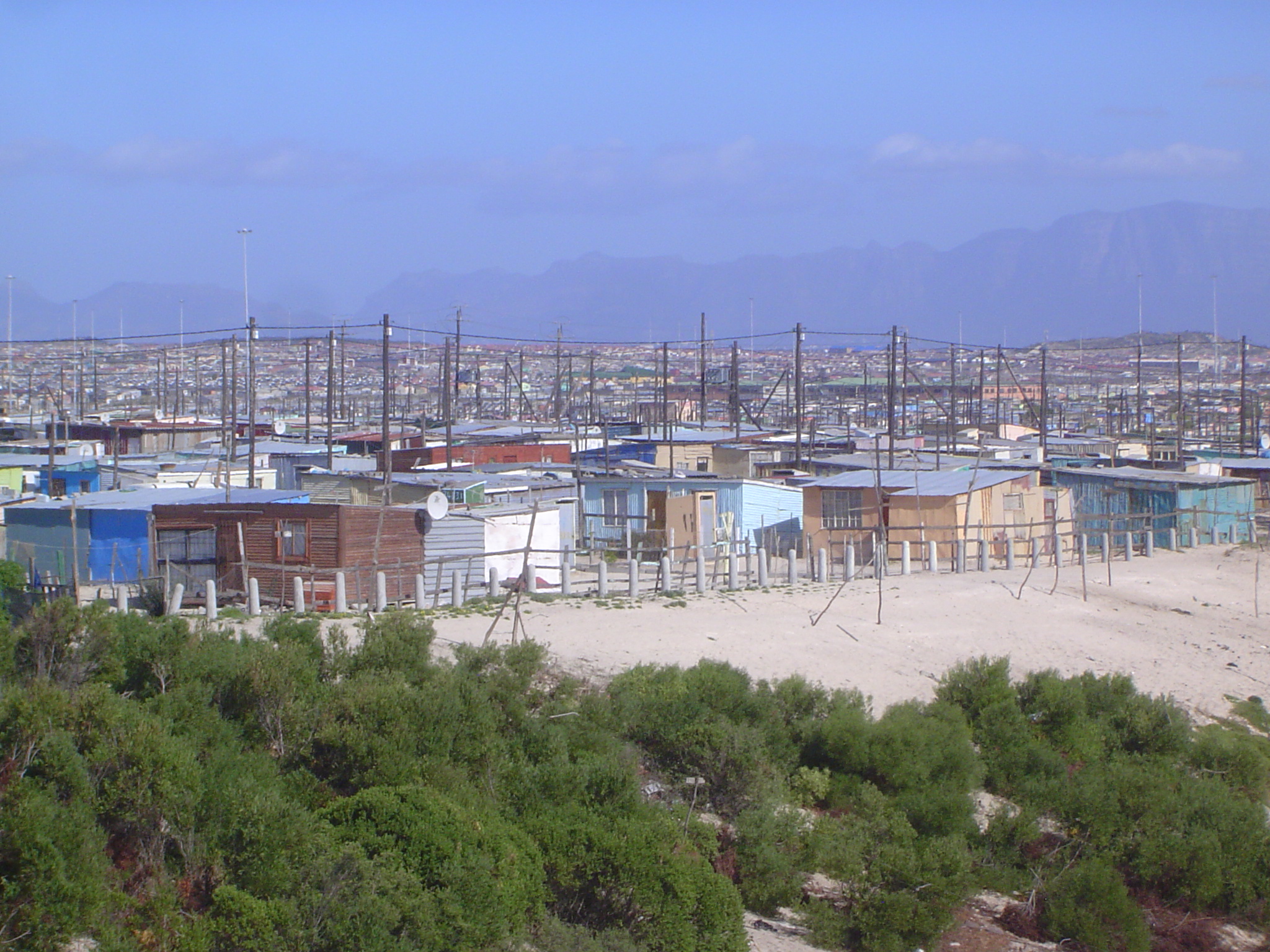 Farther east, Enkanini is an informal settlement of 11,000 huts on the edge of Khayelitsha, which itself is a settlement of perhaps half a m