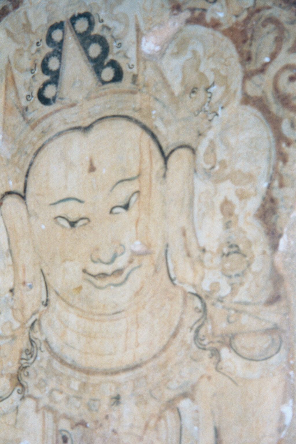 On the wall, a bodhisattva.