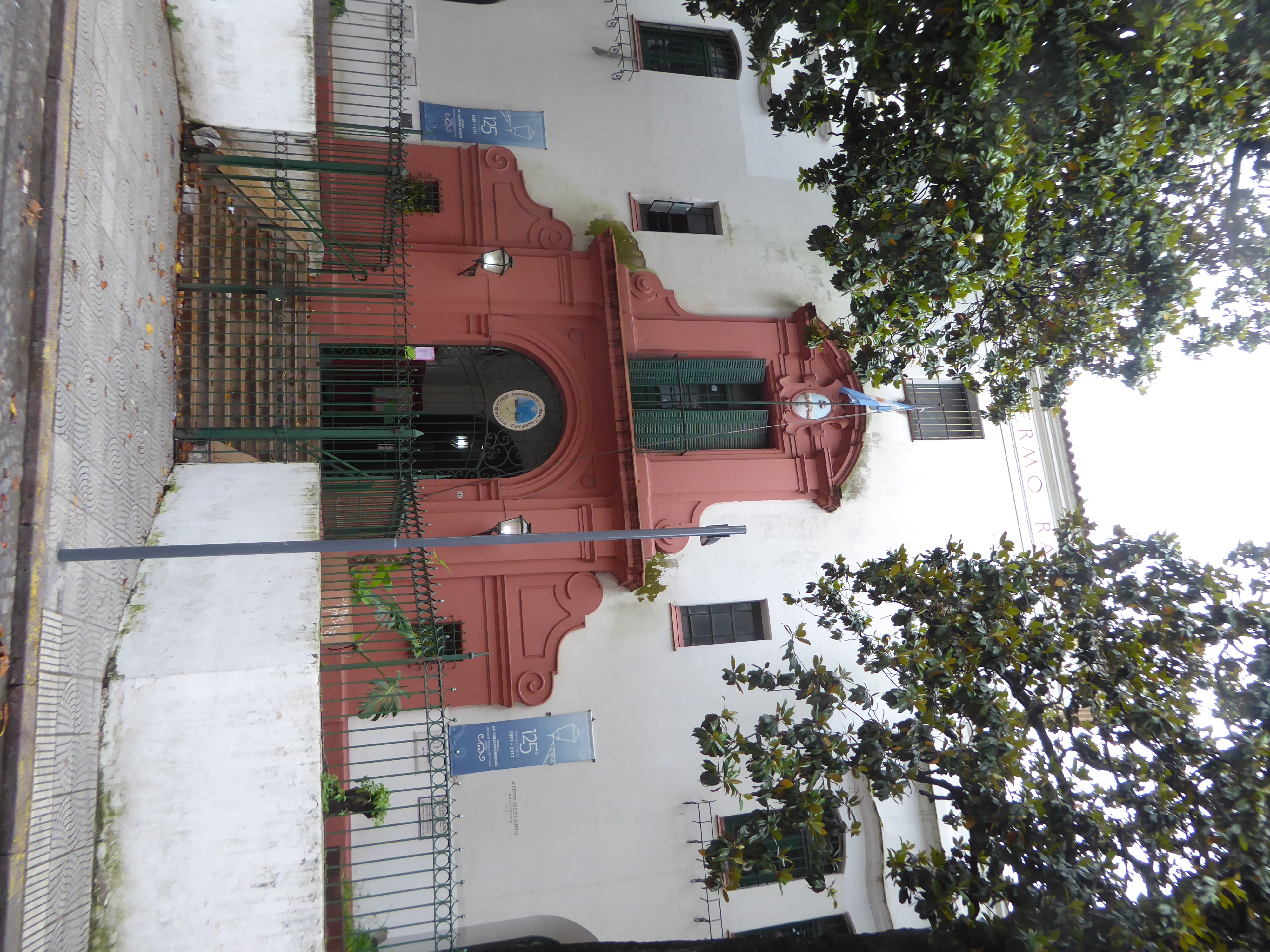 Half a block east of the plaza, here's School 22. Up top, you can catch a few letters of the name Guillermo Rawson. There's a town named for