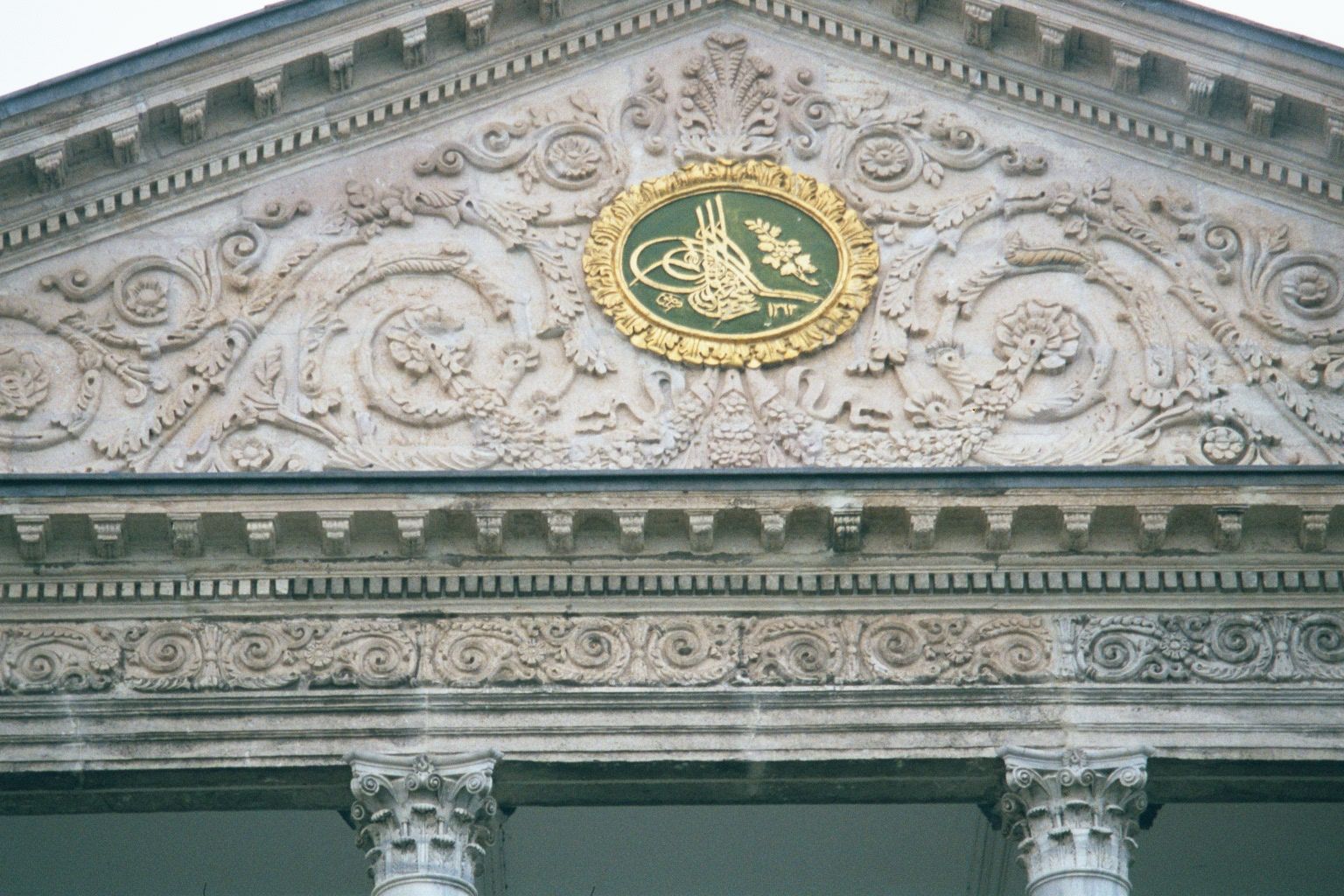 Detail of the entablature and pediment.