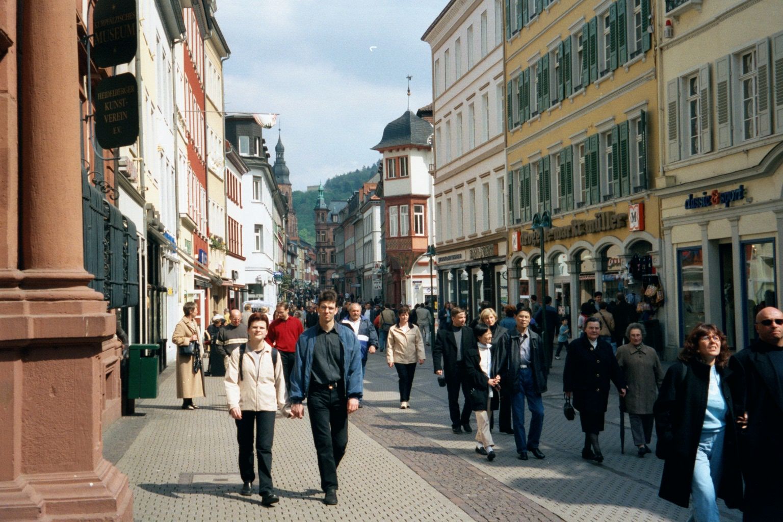 Lots and lots of pedestrians walk the Hauptstrasse.