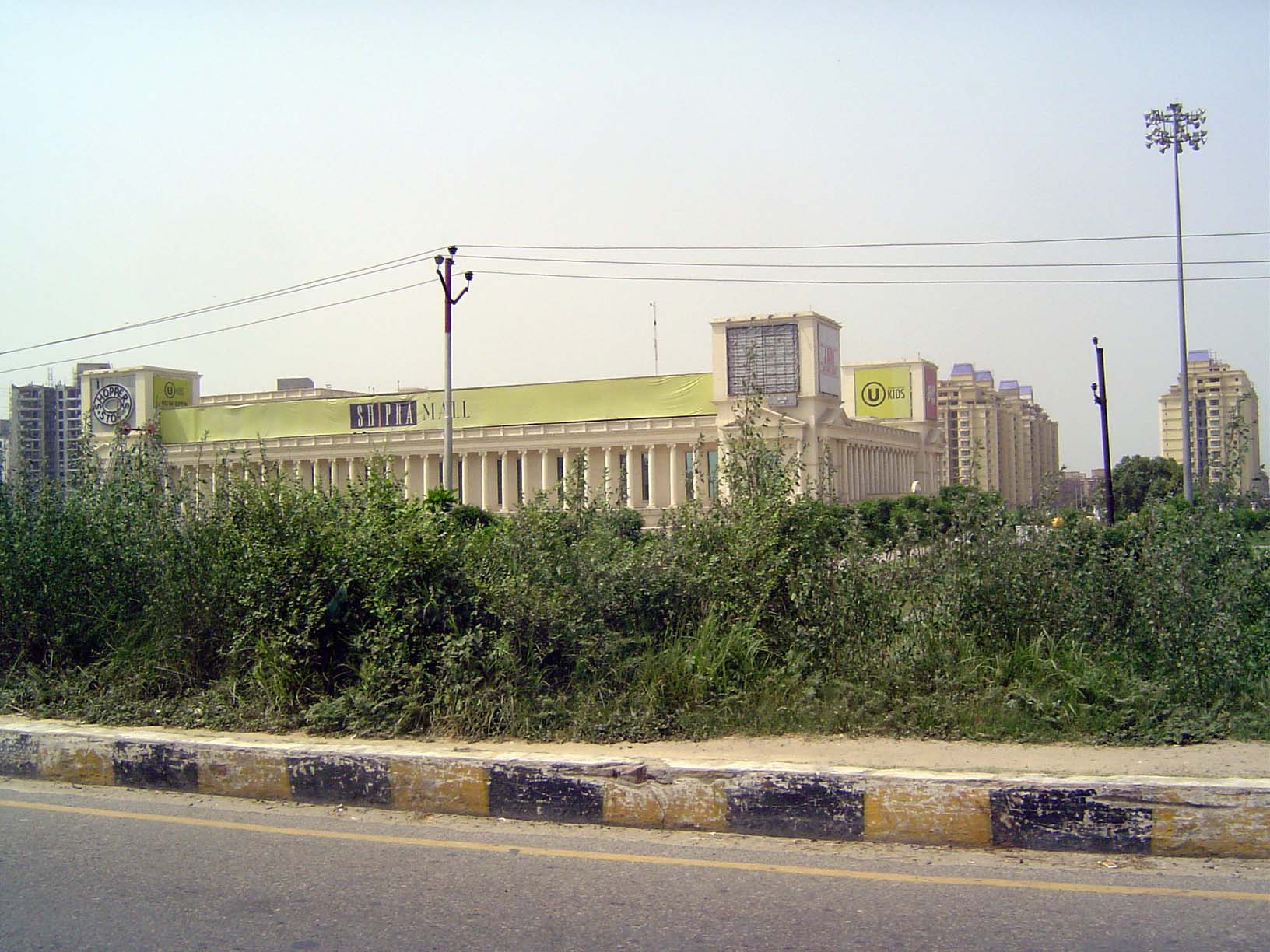 Another view. The building echoes some of the official buildings of British New Delhi, right down to the choice of color.