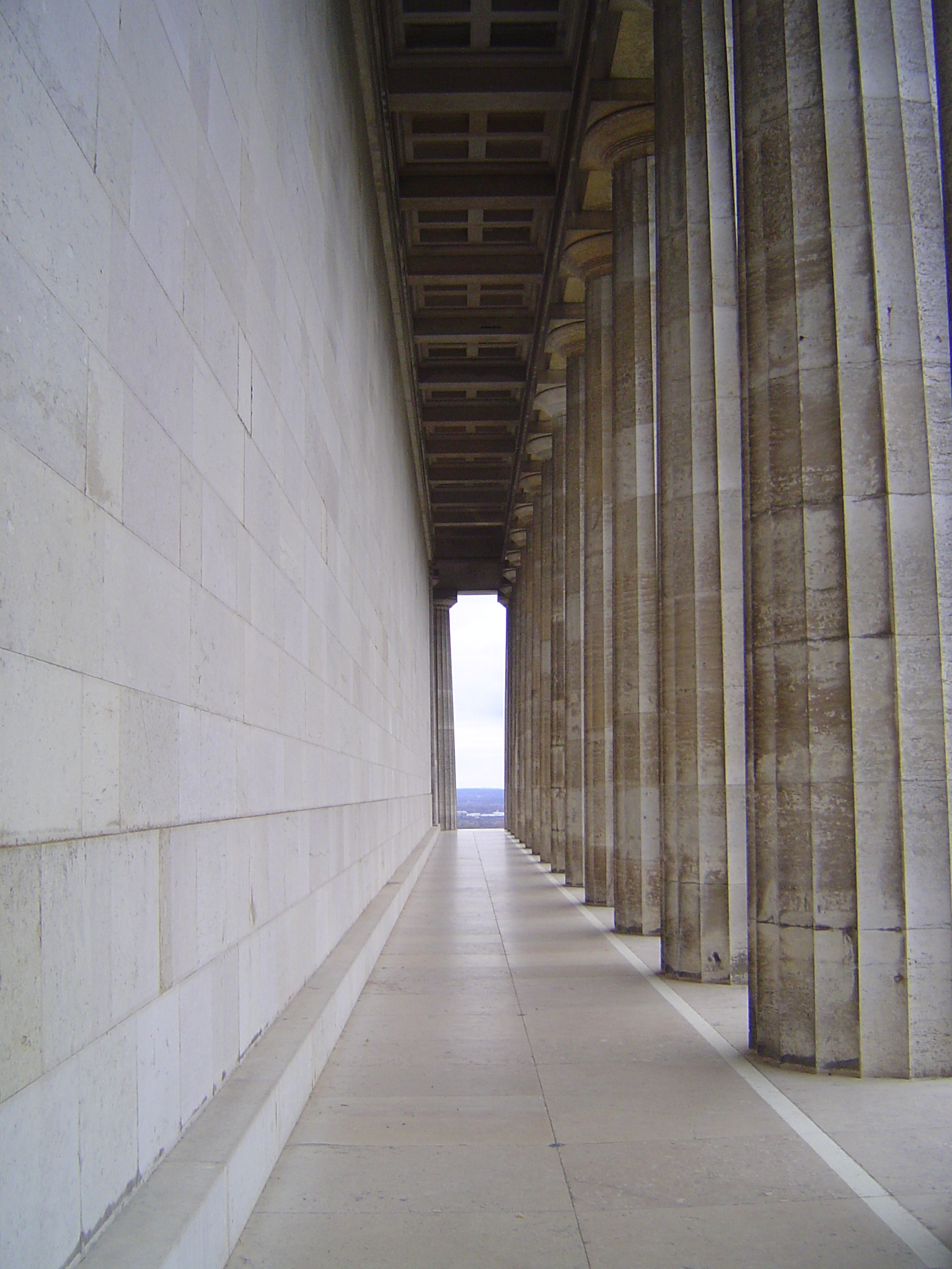 The entrance is on the other end, the side overlooking the valley.