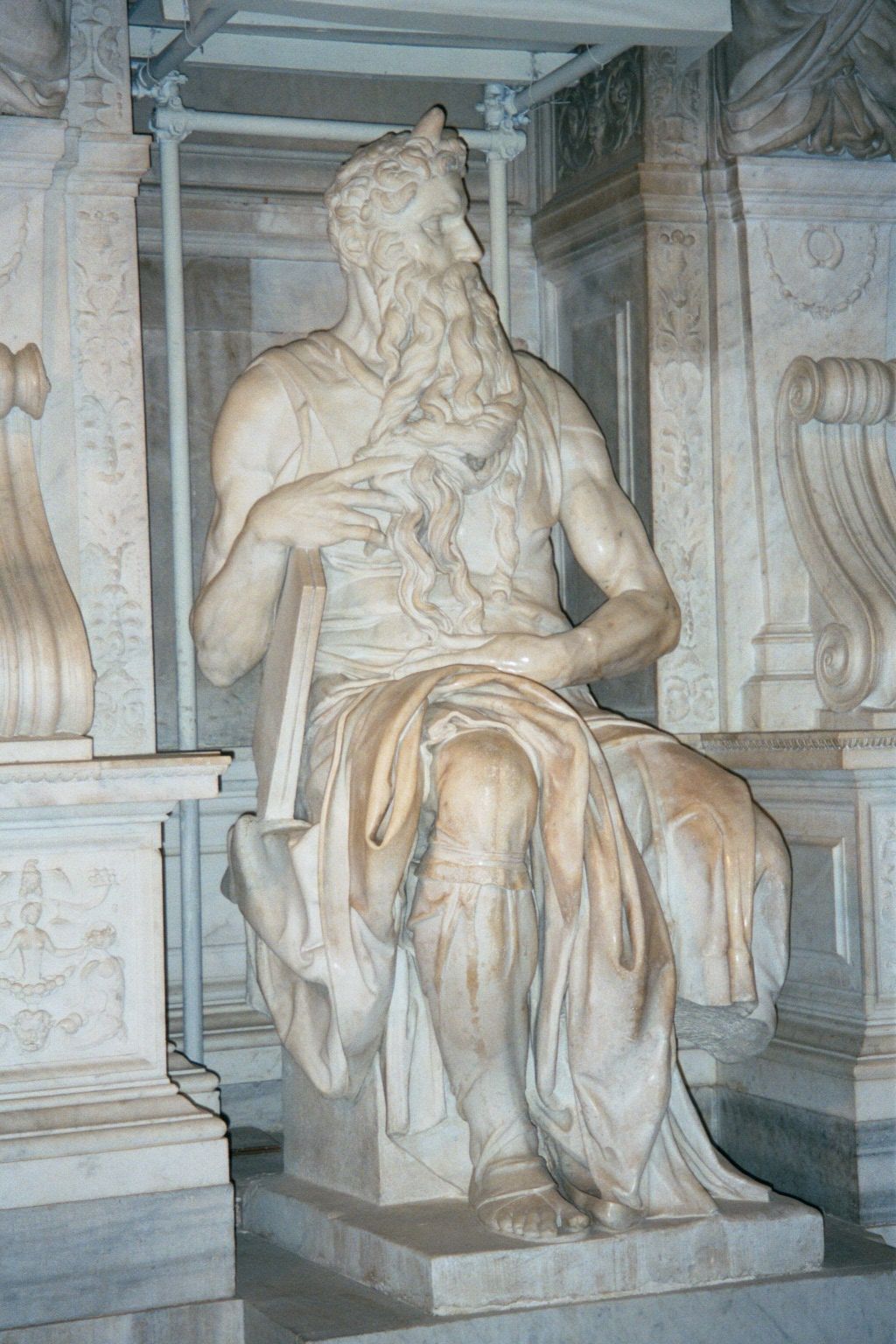 Michelangelo's statue in its entirety, unnaturally tense. Freud is said to have speculated that the muscles were bulging because Moses had j