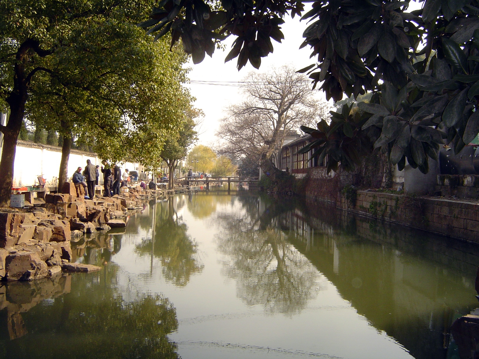 There aren't many—or perhaps any—working boats on Suzhou's canals today, which serve mostly a touristic purpose—here on the approach to one