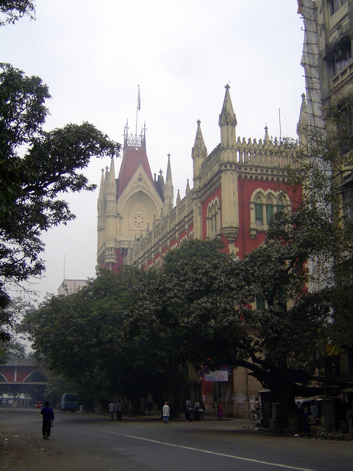A block closer to the river—and only a block from it—is an adaptation of the Cloth Hall at Ypres. It's the High Court, 1872, designed by the