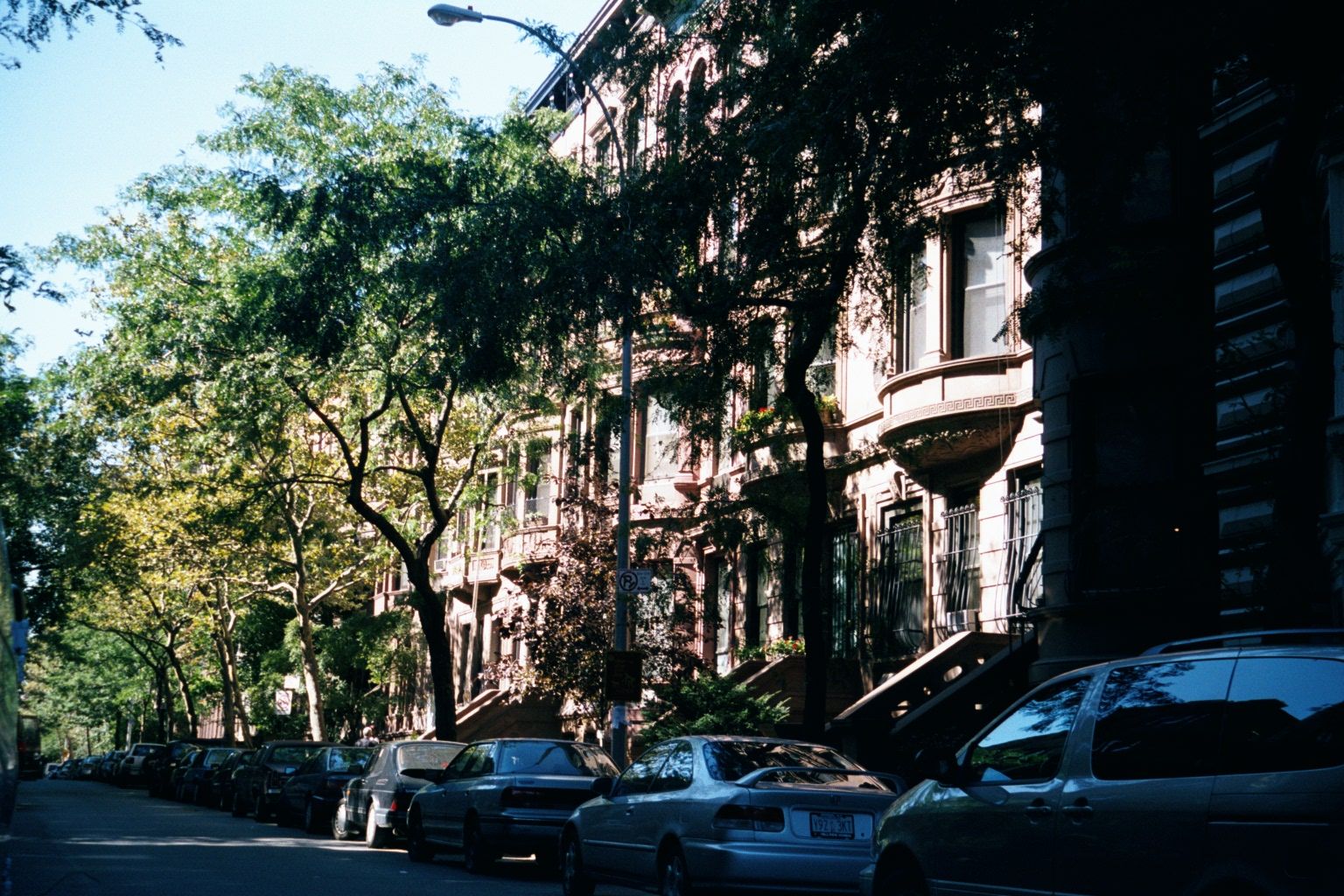 Brownstones on West 90th Street reveal the common density of residential neighborhoods in the 19th century.