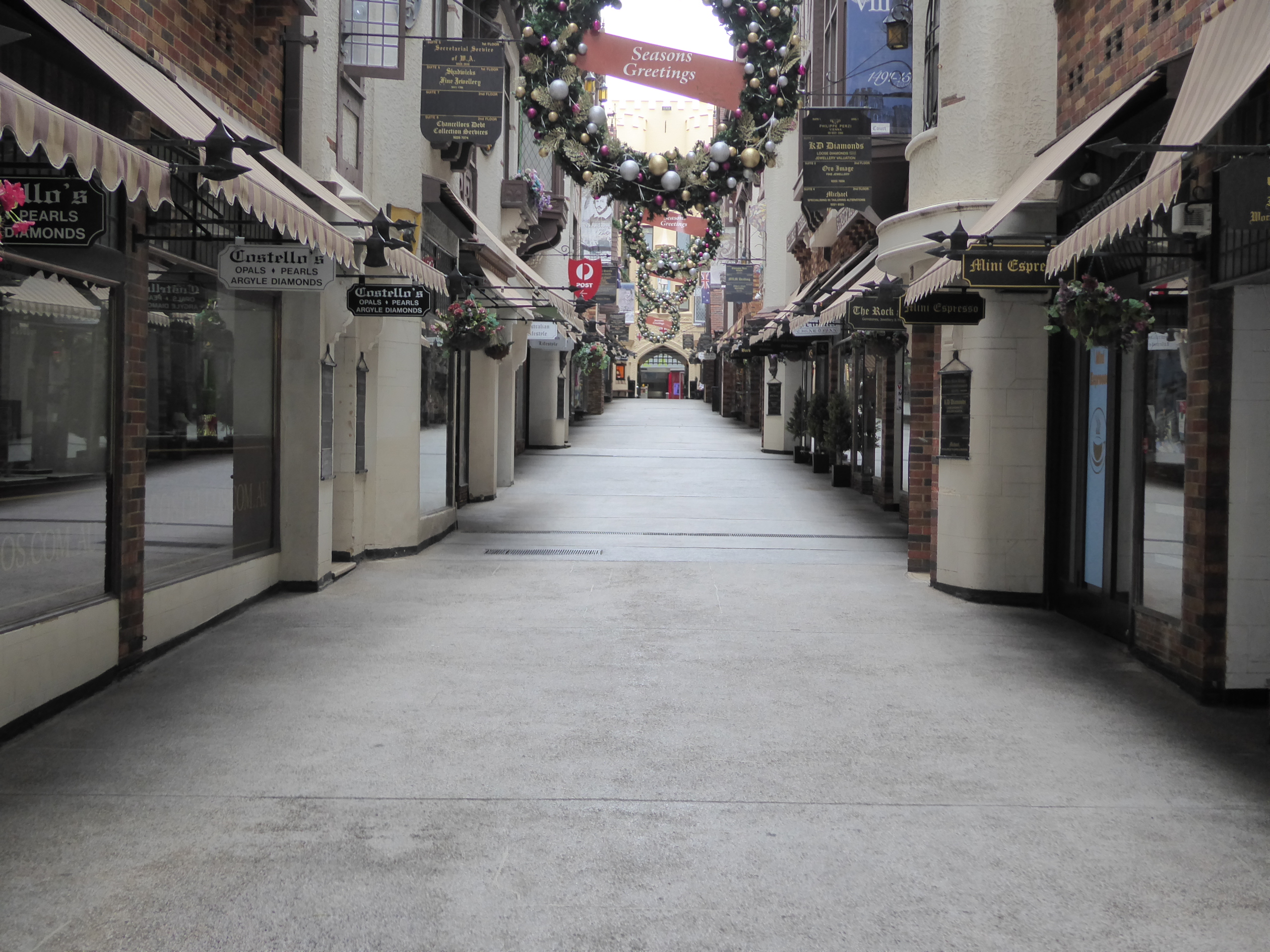 Tudor Court runs right through the block and echoes several London arcades. You'd think someone would install a bench, but no, the owners do