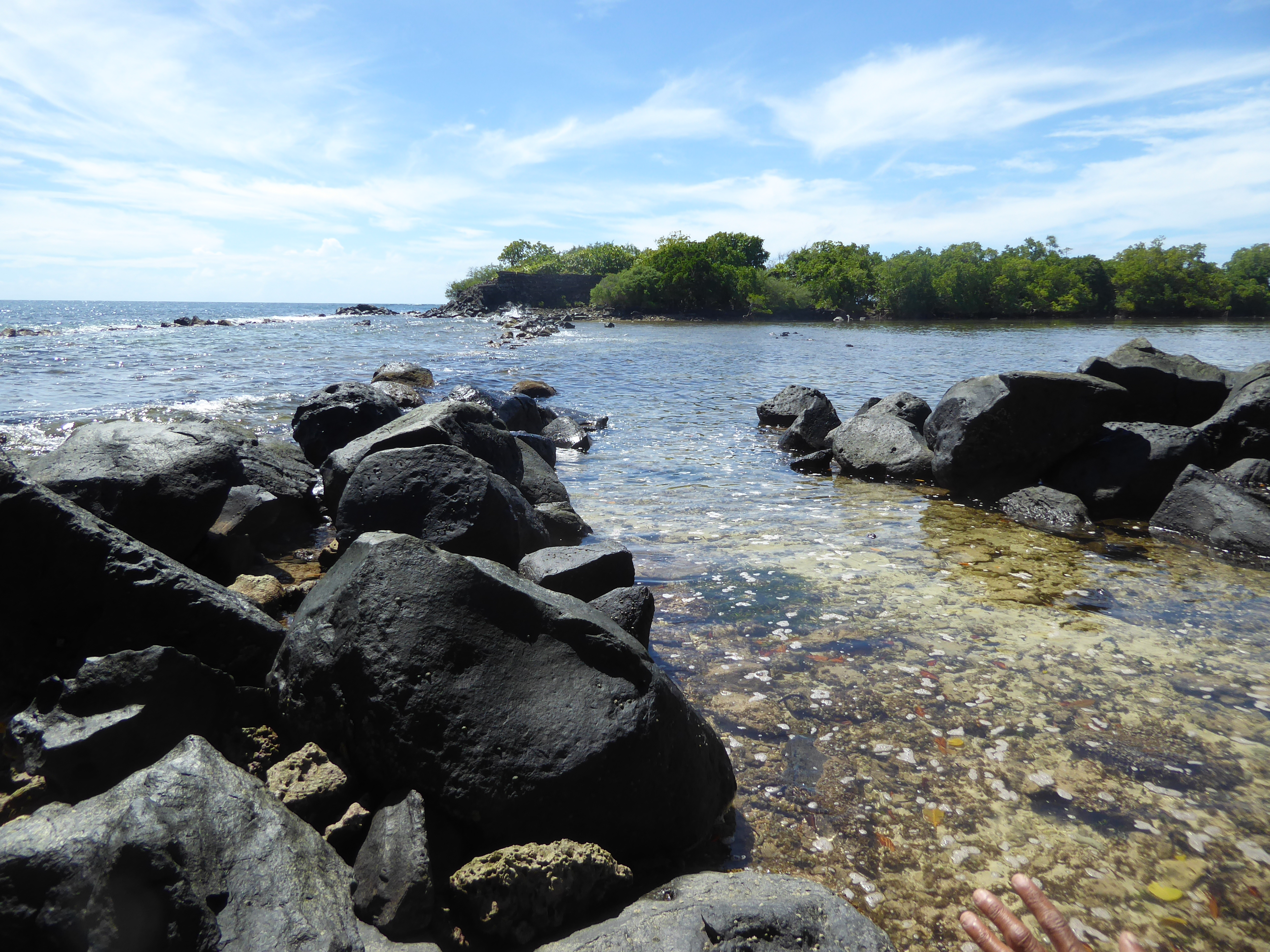 There's Kerian, which used to be linked to Nan Douwas by a wall, now mostly gone. See the wall on the islet?