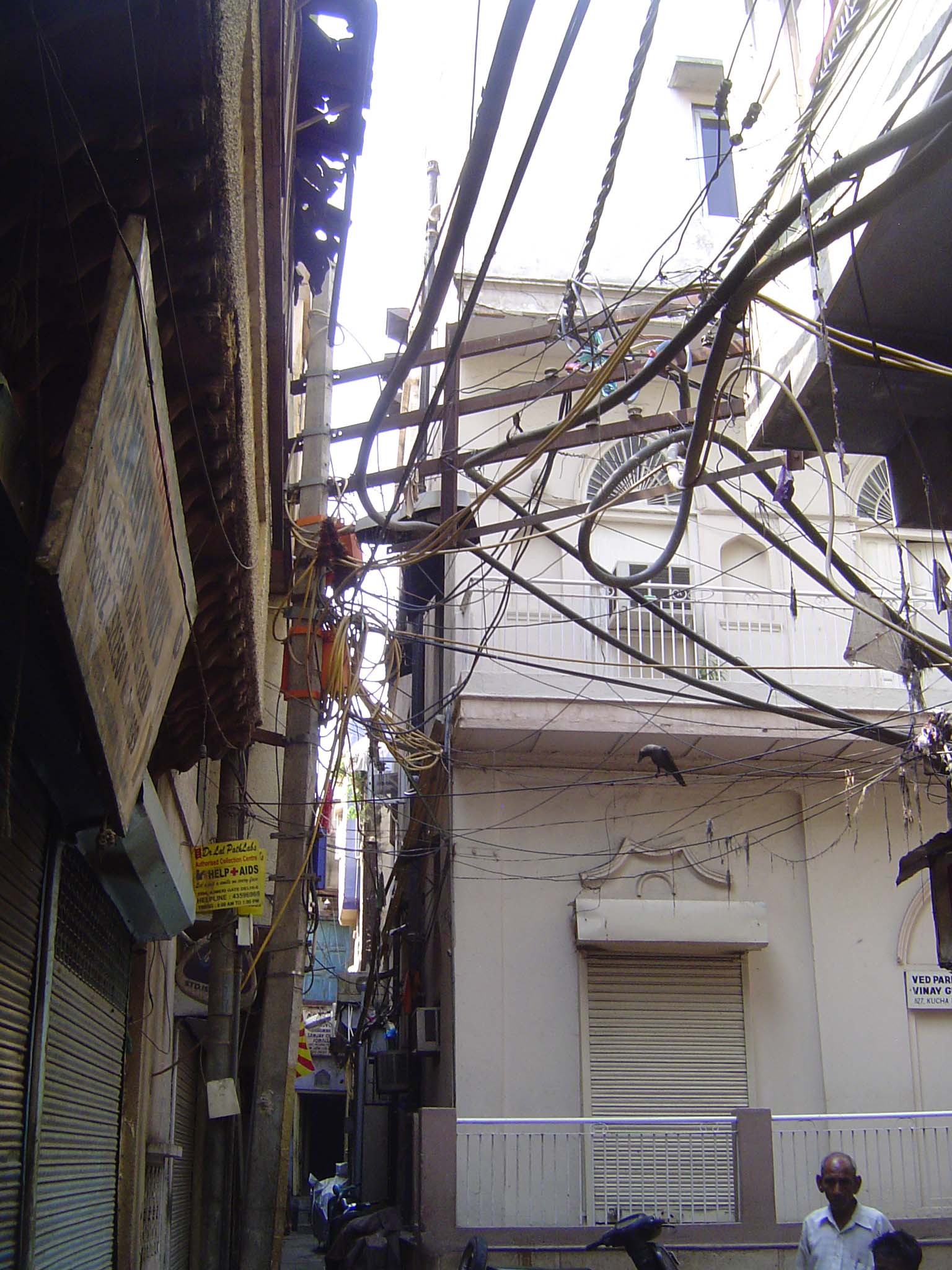 Is it an alley or a powerline conduit with pedestrian access?