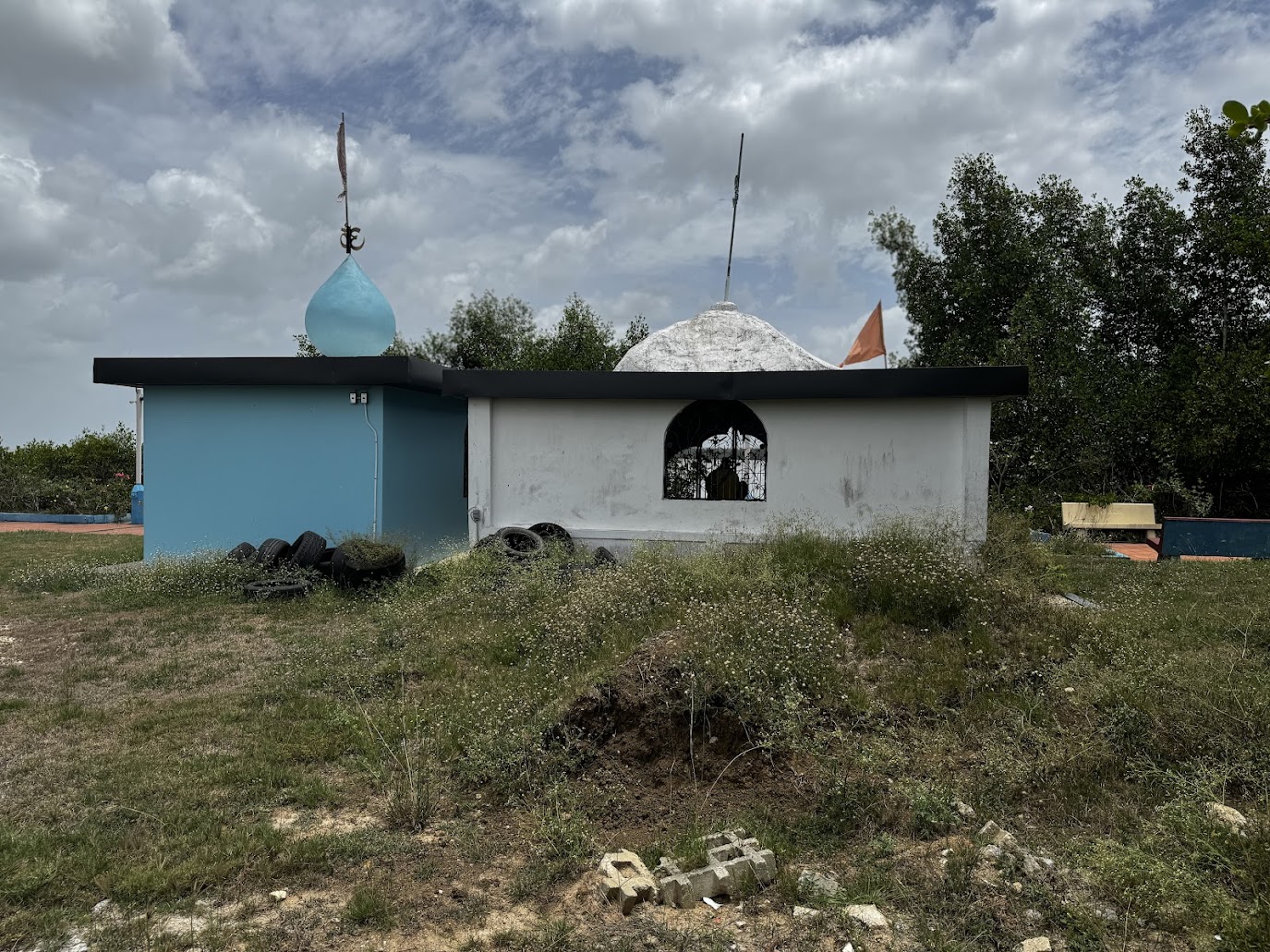 A side building seen from the back reveals a bit of the original structure.