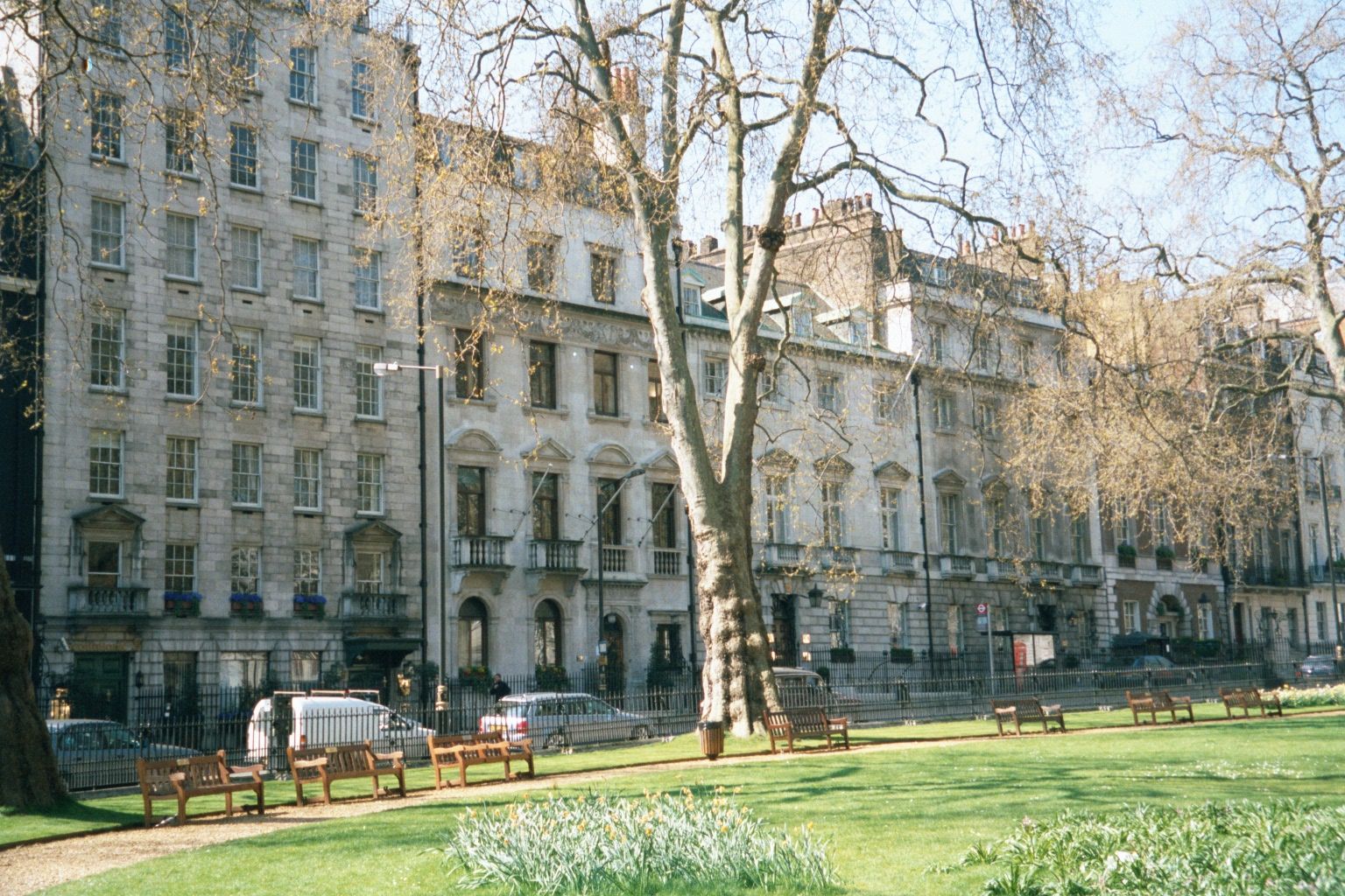 Such houses were too much for all but the wealthiest. Here we've descended a notch to the townhouses around Berkeley Square, which was laid