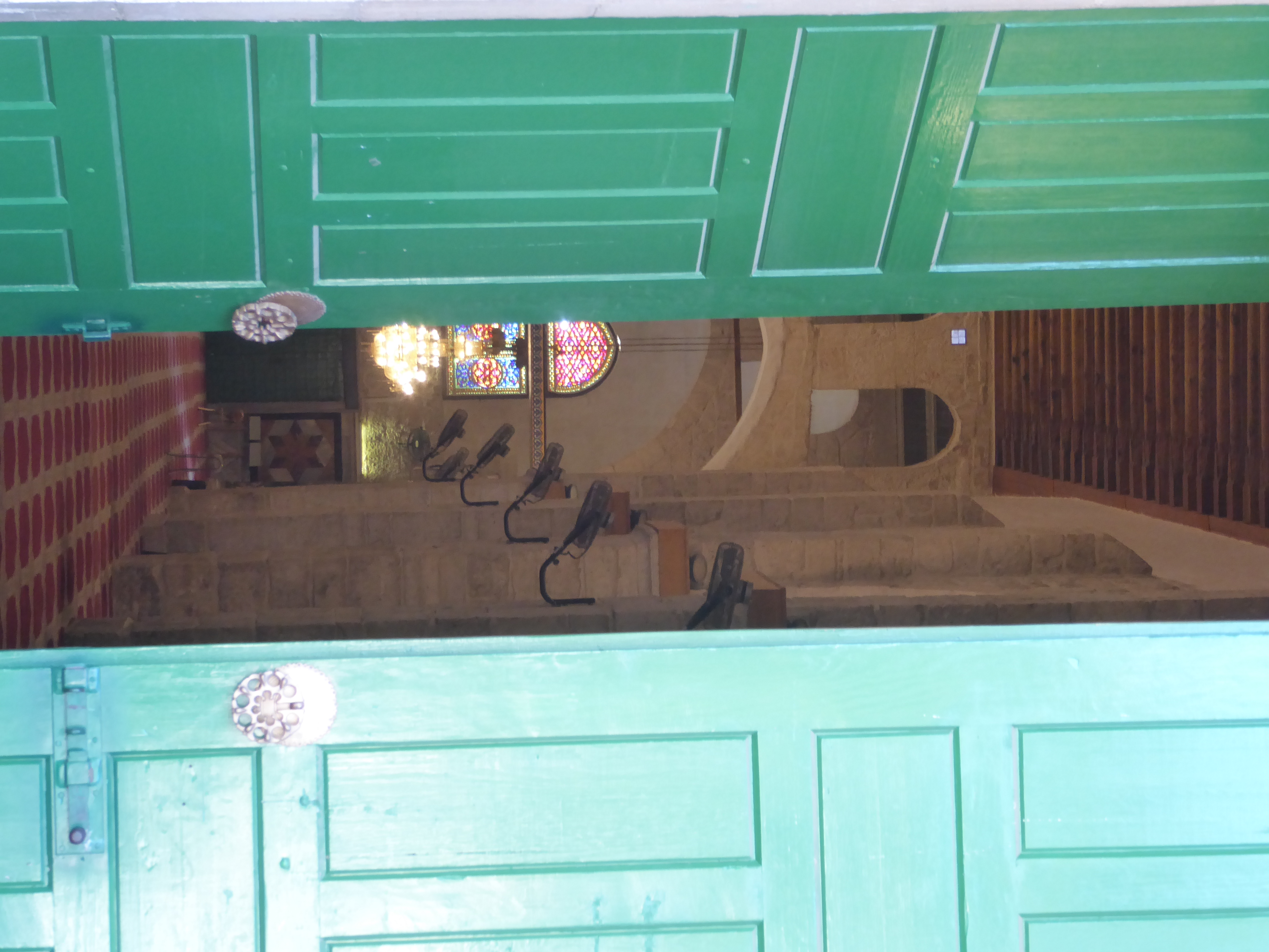 A peek inside, with columns donated by Mussolini and ceiling paintings from Egypt's Farouk. Nothing remains of the original mosque. Were its