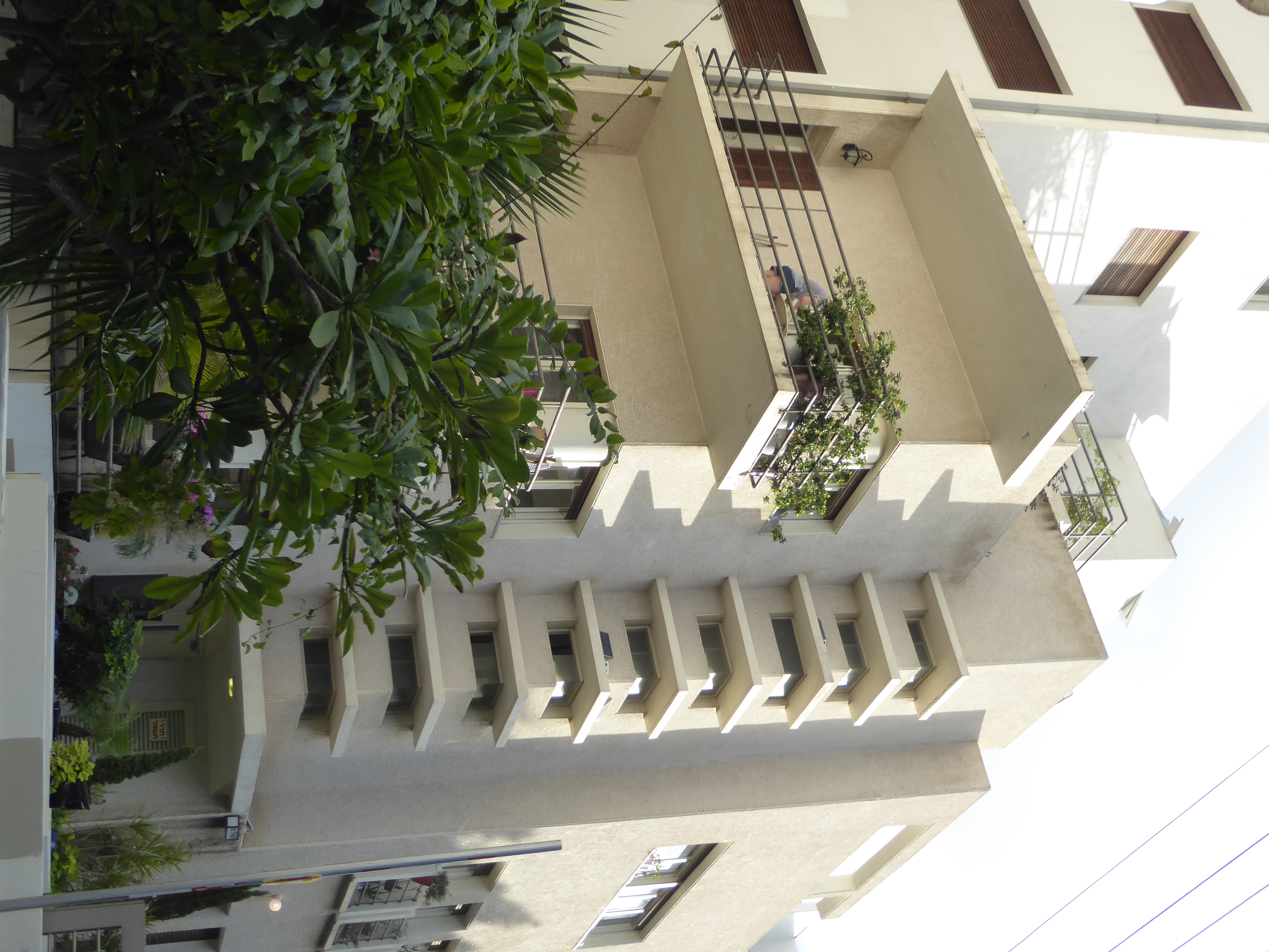 A so-called ladder staircase makes Rothschild 118 more interesting than it would otherwise be.